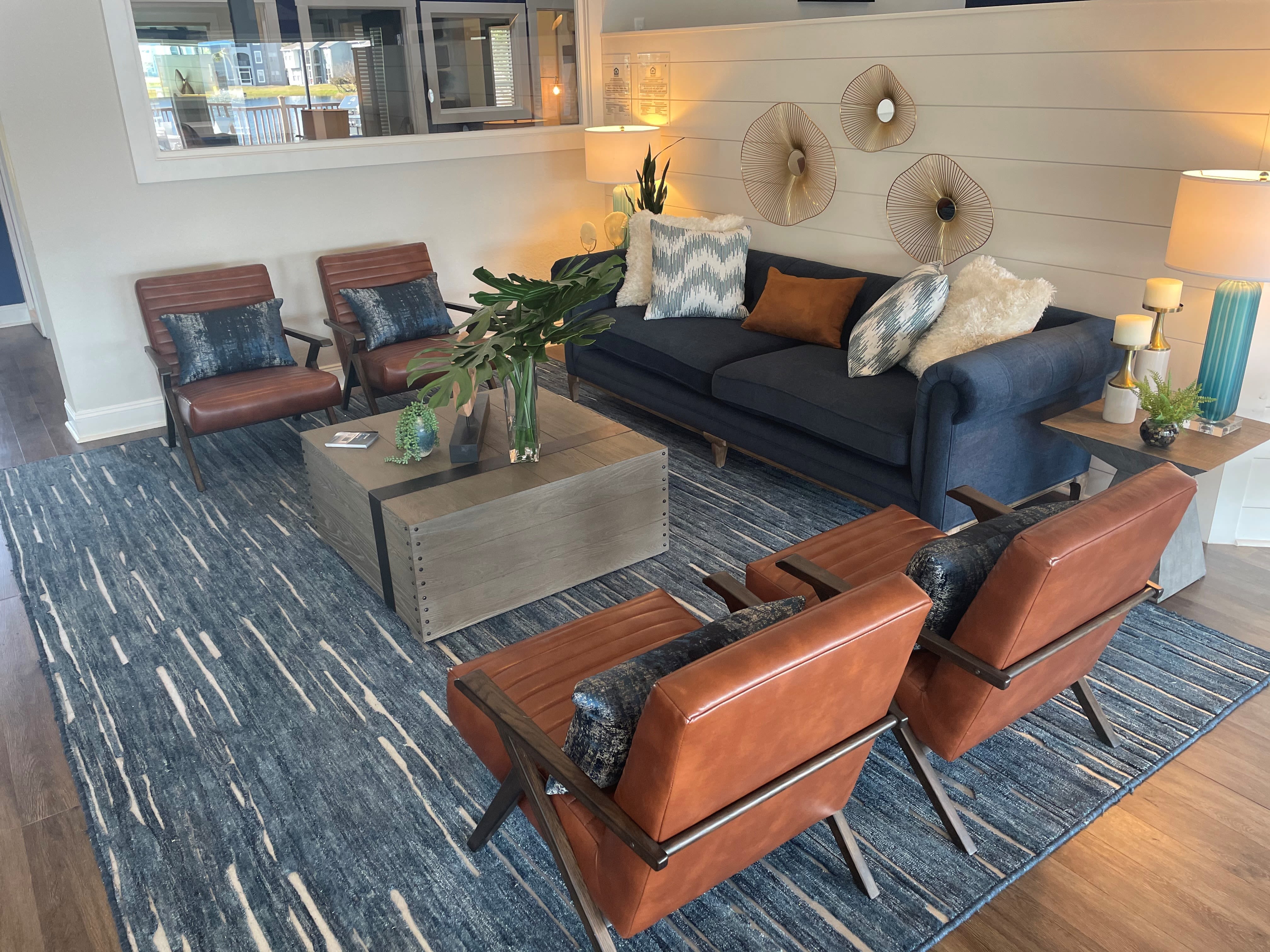 A model home's living room at Onyx Winter Park in Casselberry, FL