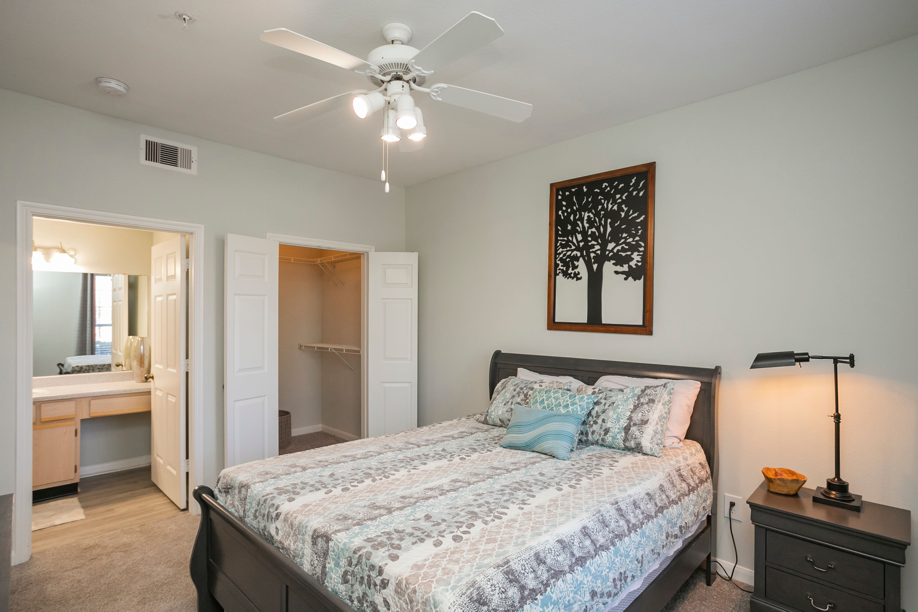 Modern bedroom with ceiling fan at Pinnacle Heights in Antioch, Tennessee