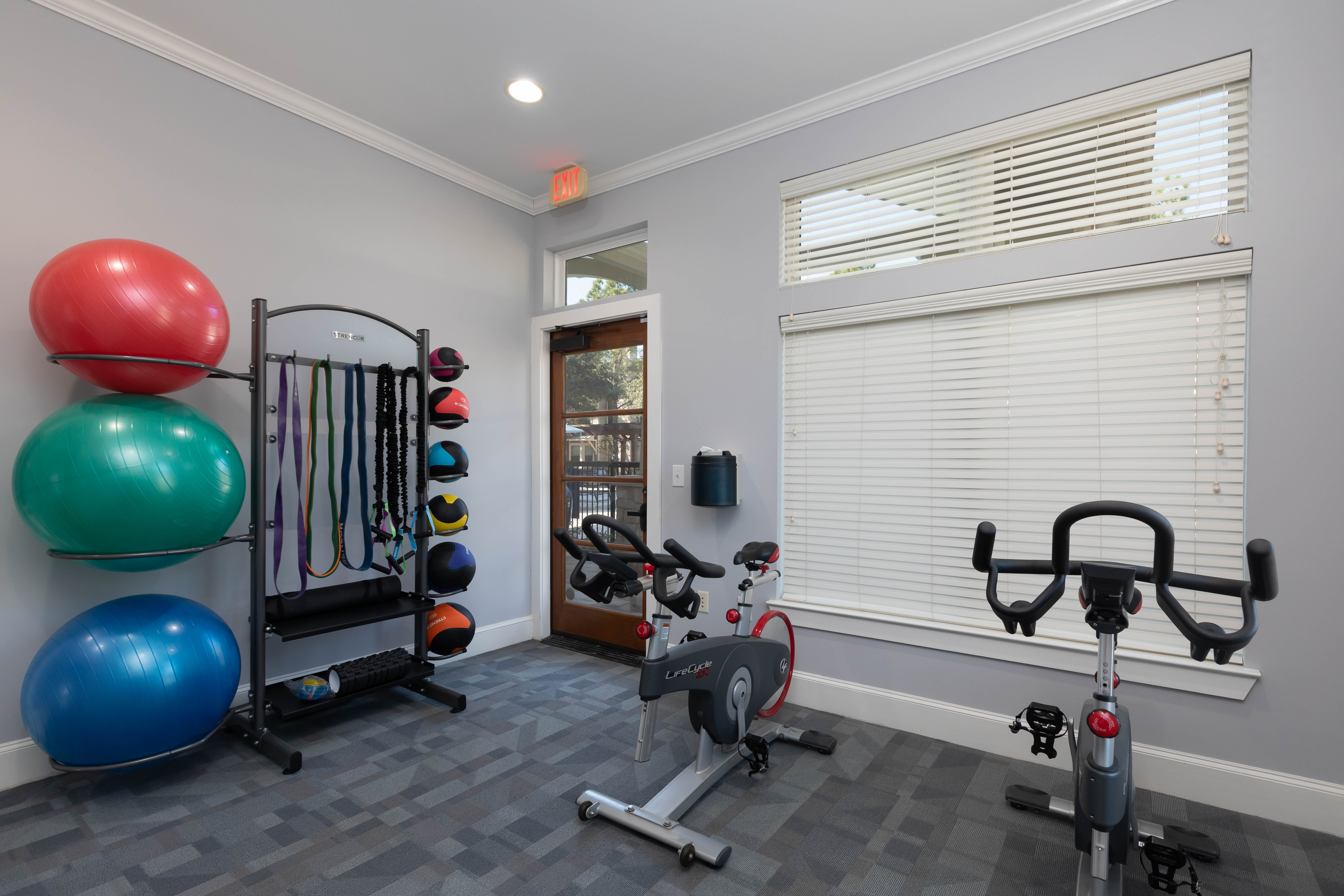 Modern spin room and fitness center at Lakefront Villas