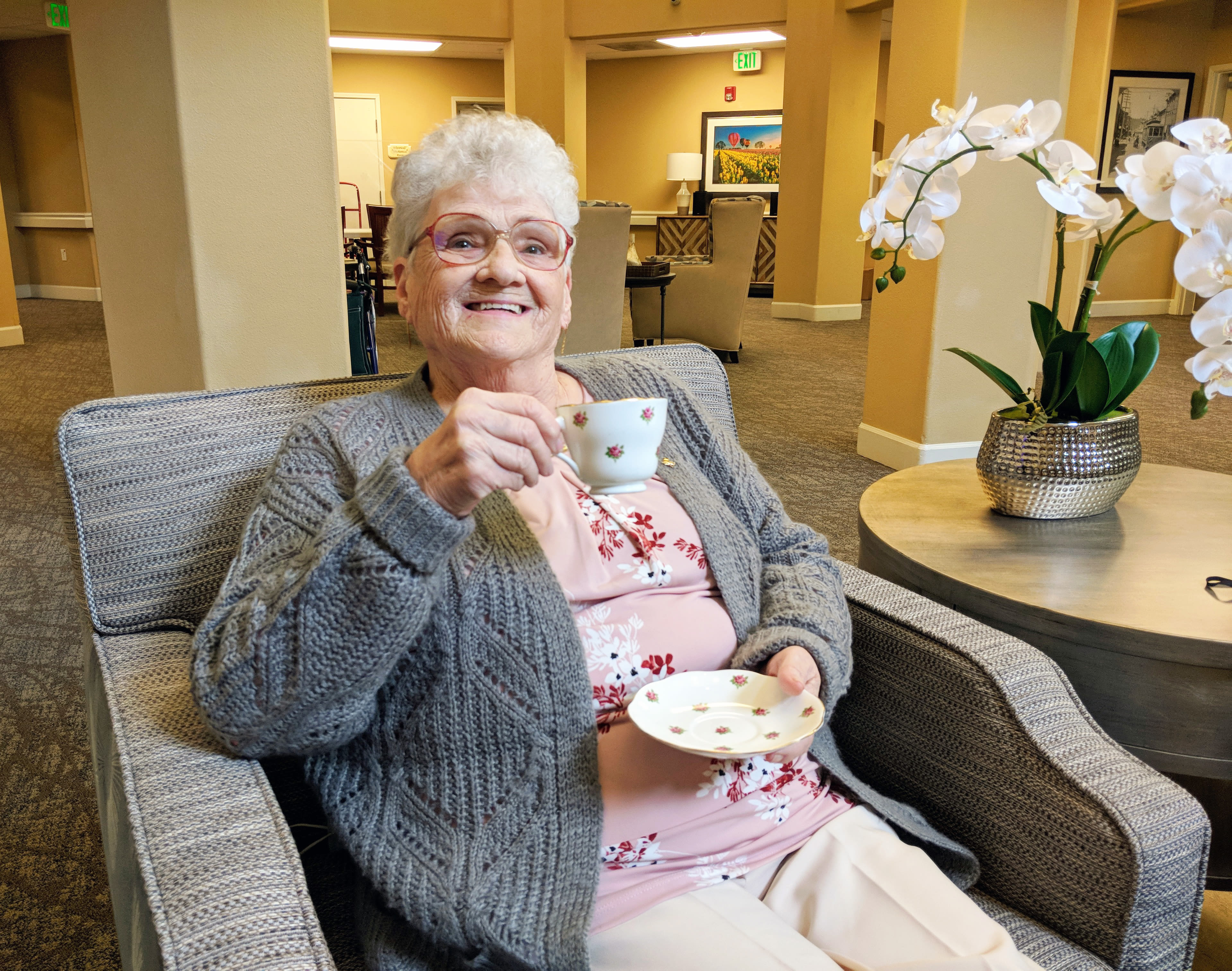 Drinking a warm cup of tea at Timber Pointe Senior Living in Springfield, Oregon