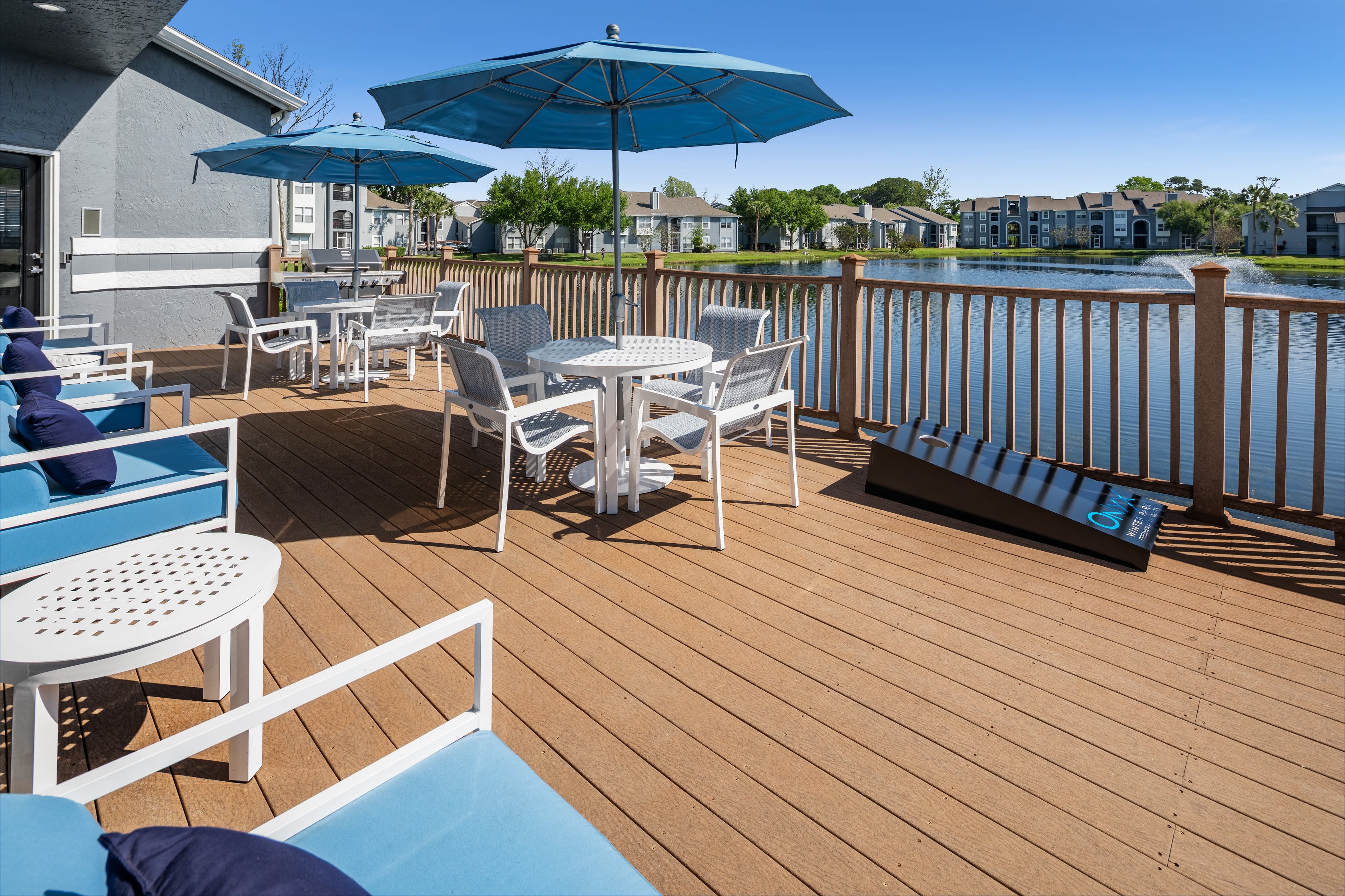 The dock with patio furniture at Onyx Winter Park in Casselberry, FL