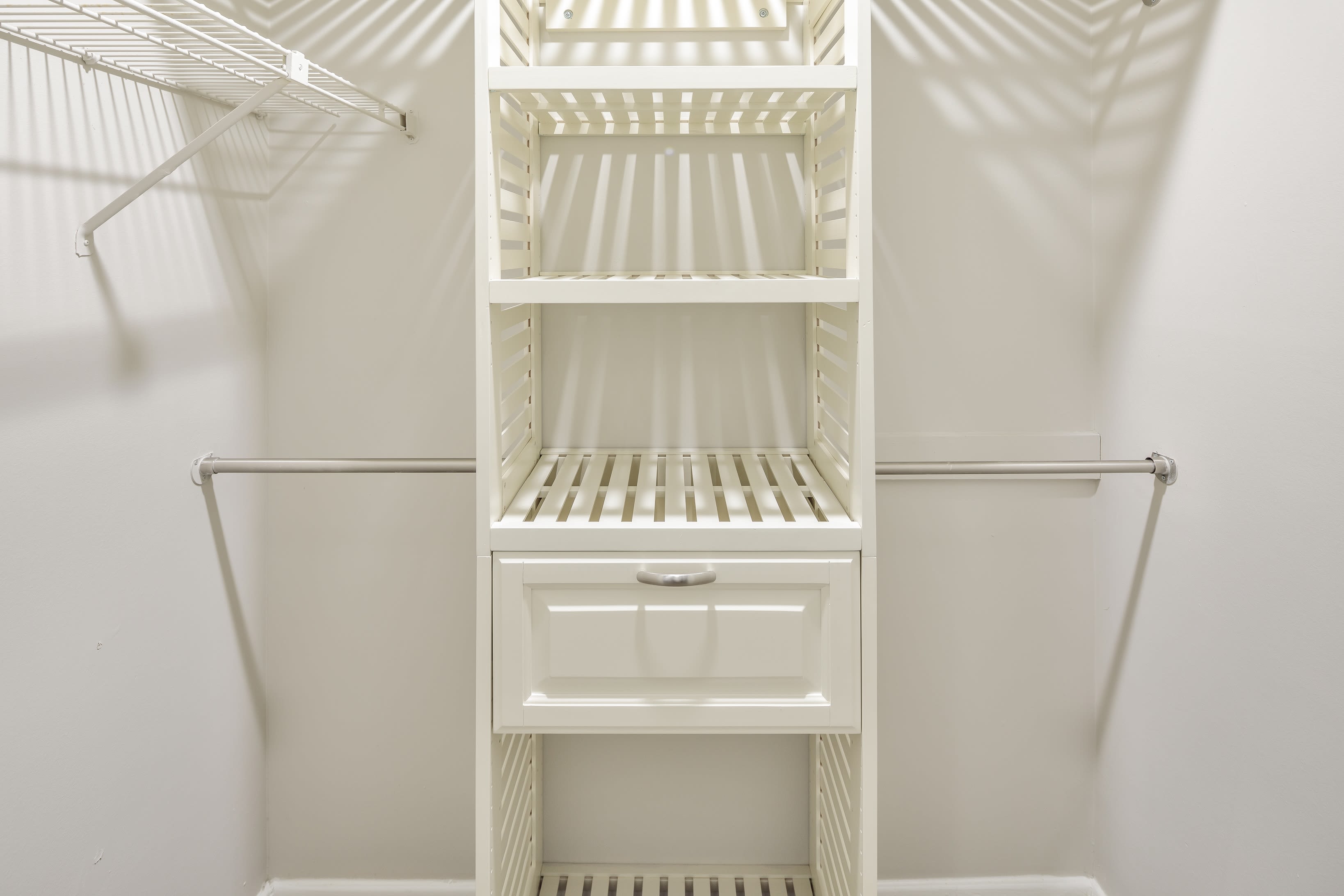 A walk-in closet at The Everette at East Cobb in Marietta, Georgia