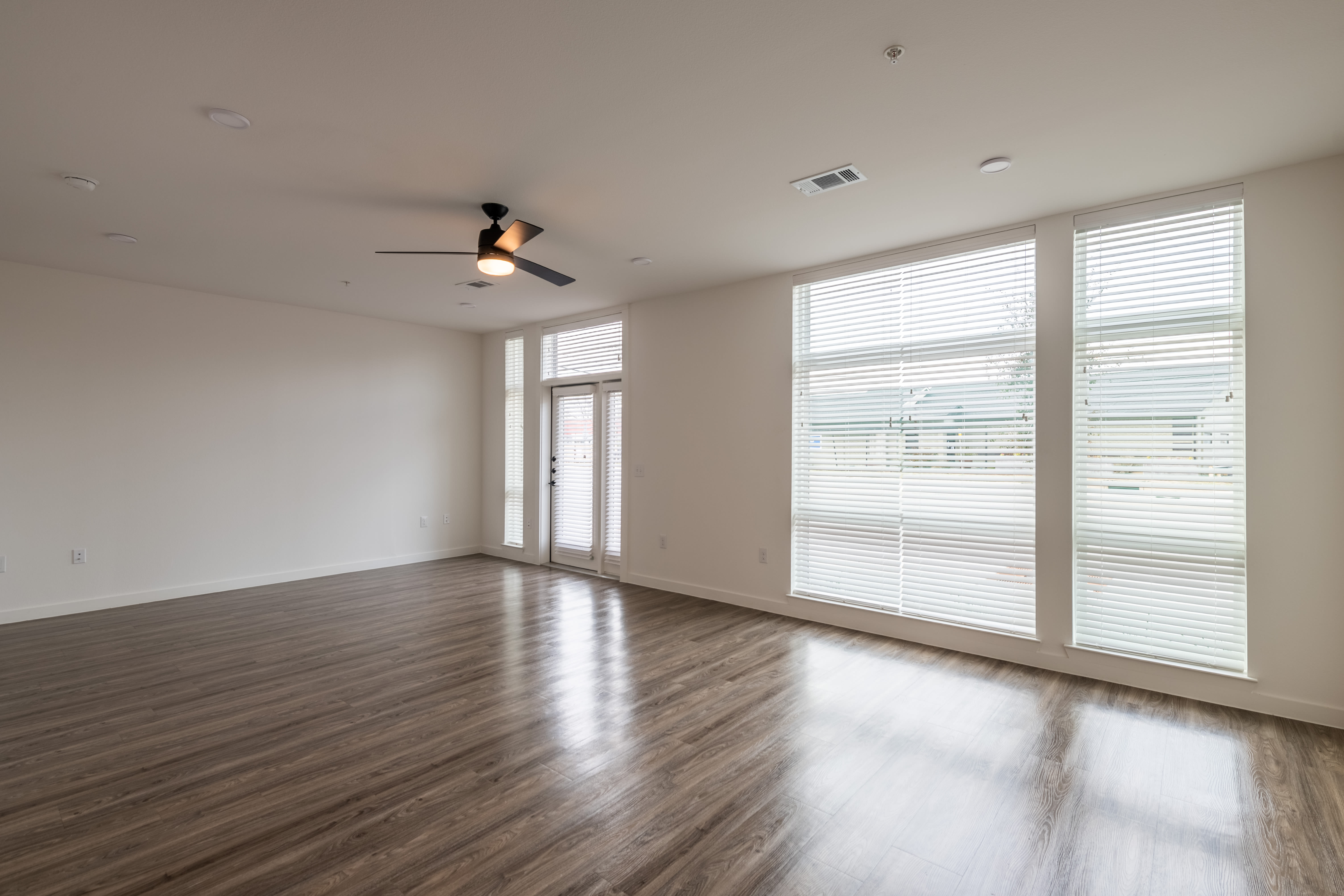 Large window wood floor room with a view at The Langford in Dallas,TX}}