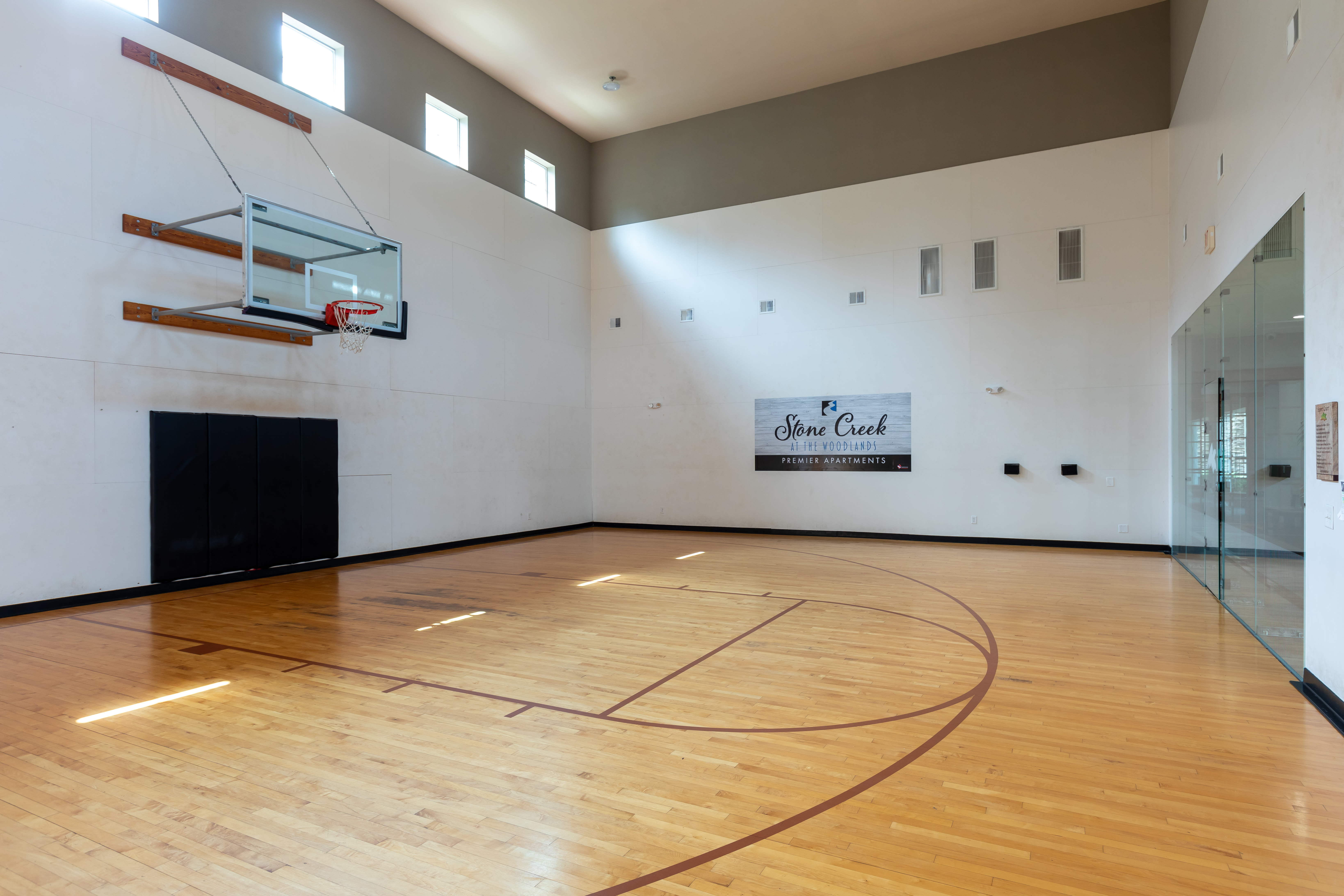 Indoor basketball court at Stone Creek at The Woodlands in The Woodlands, Texas