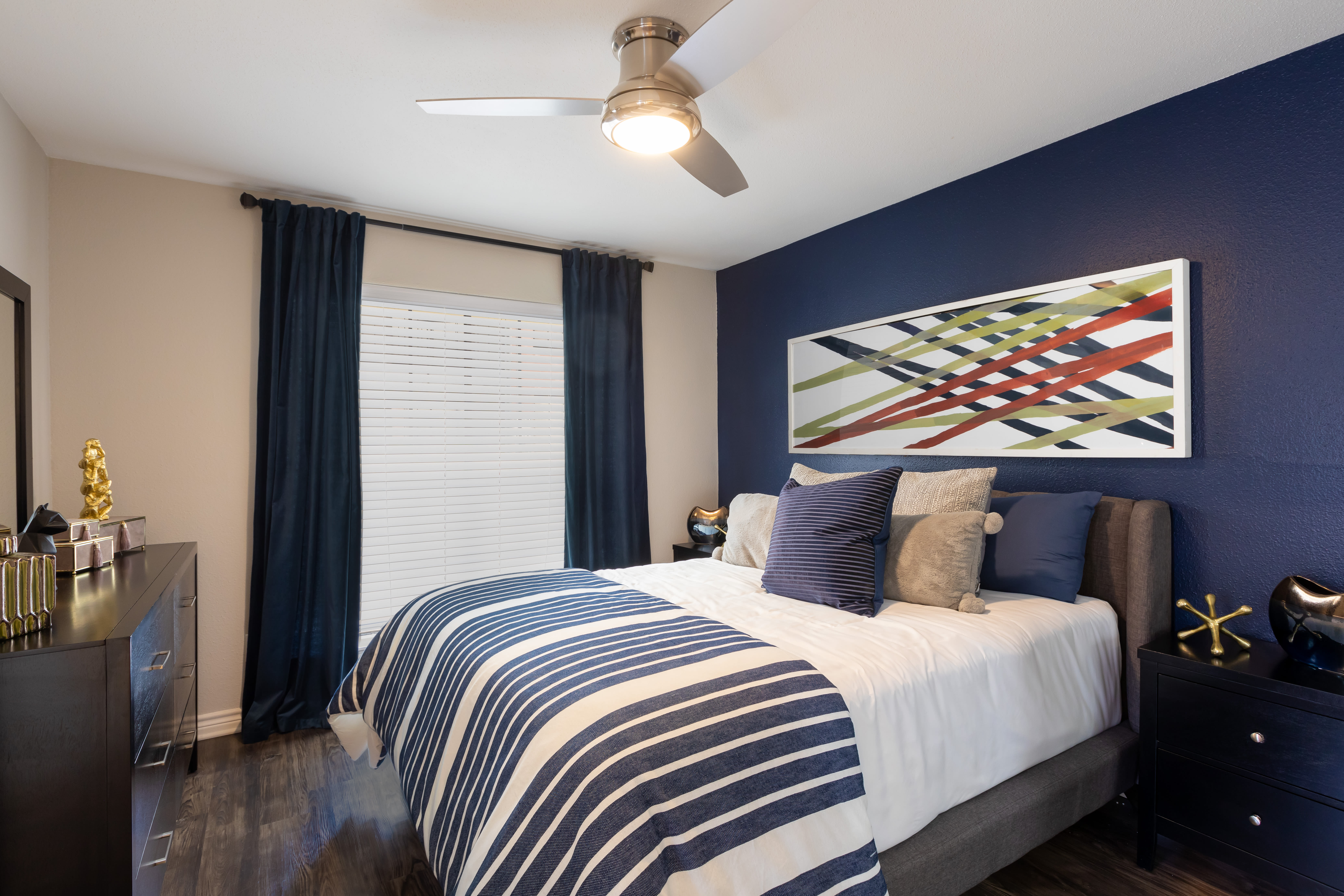 A furnished bedroom at McAlister in Webster, Texas