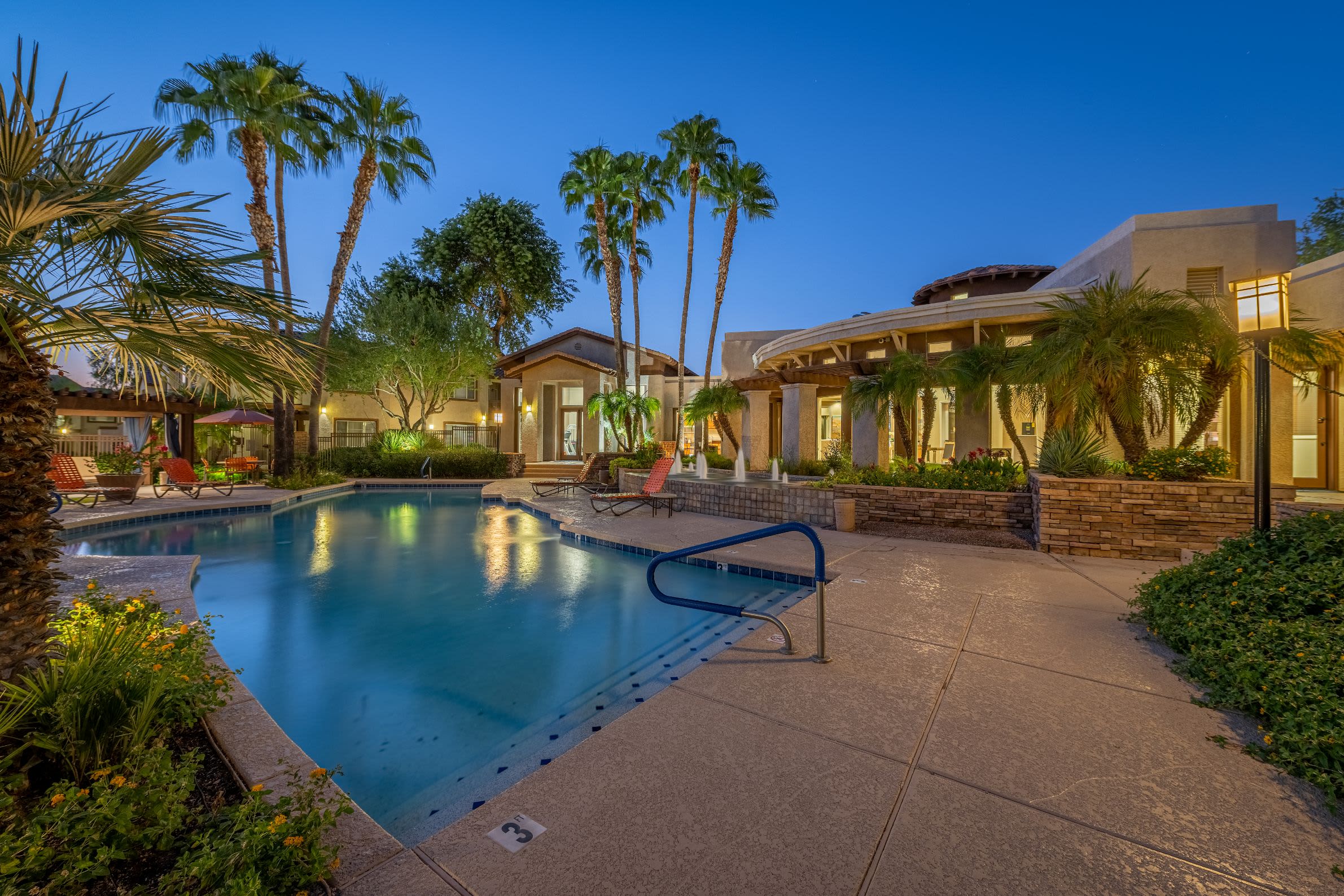Resort style pool at dusk Azure Creek in Cave Creek, Arizona