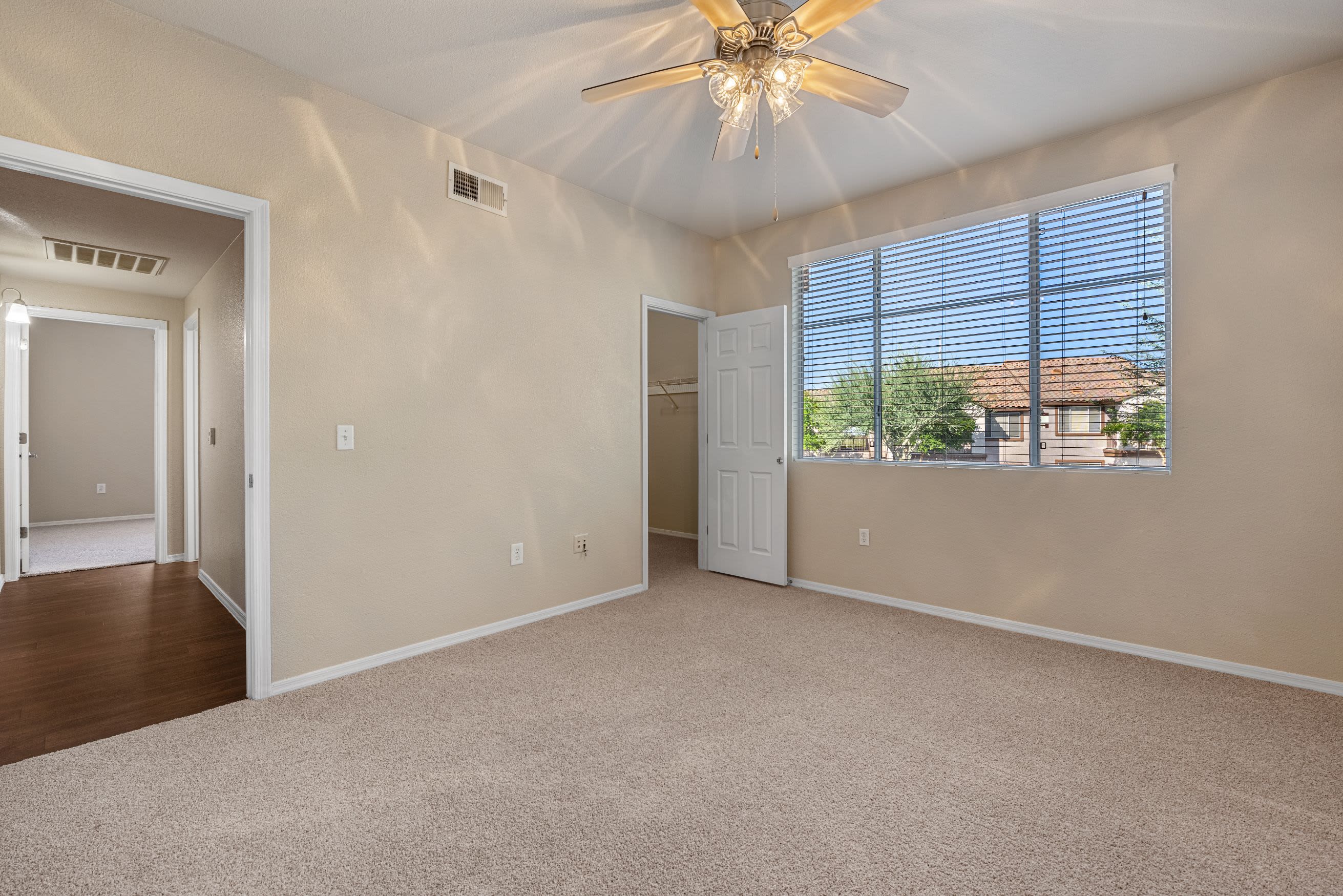 Bedroom with carpet and a ceiling fan at Azure Creek in Cave Creek, Arizona