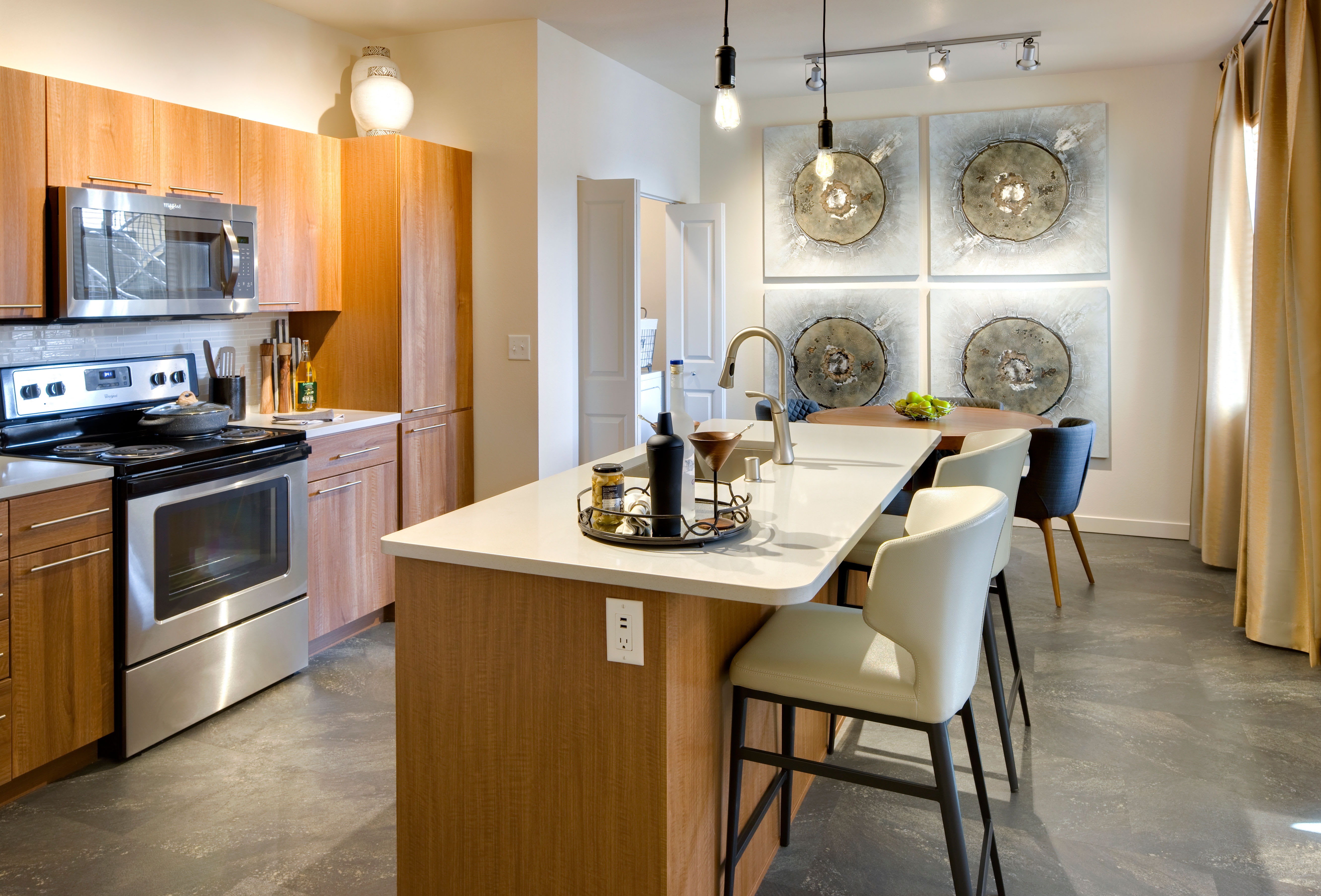 Kitchen and living areas of a model home at Olympus Alameda in Albuquerque, New Mexico