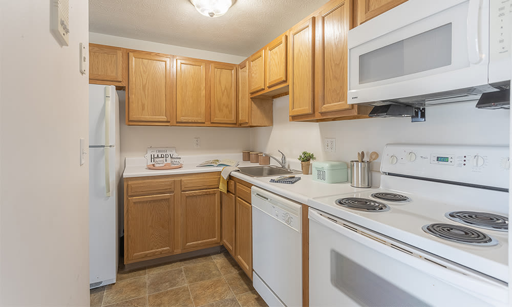 Fully equipped kitchen at Webster Manor Apartments in Webster, New York