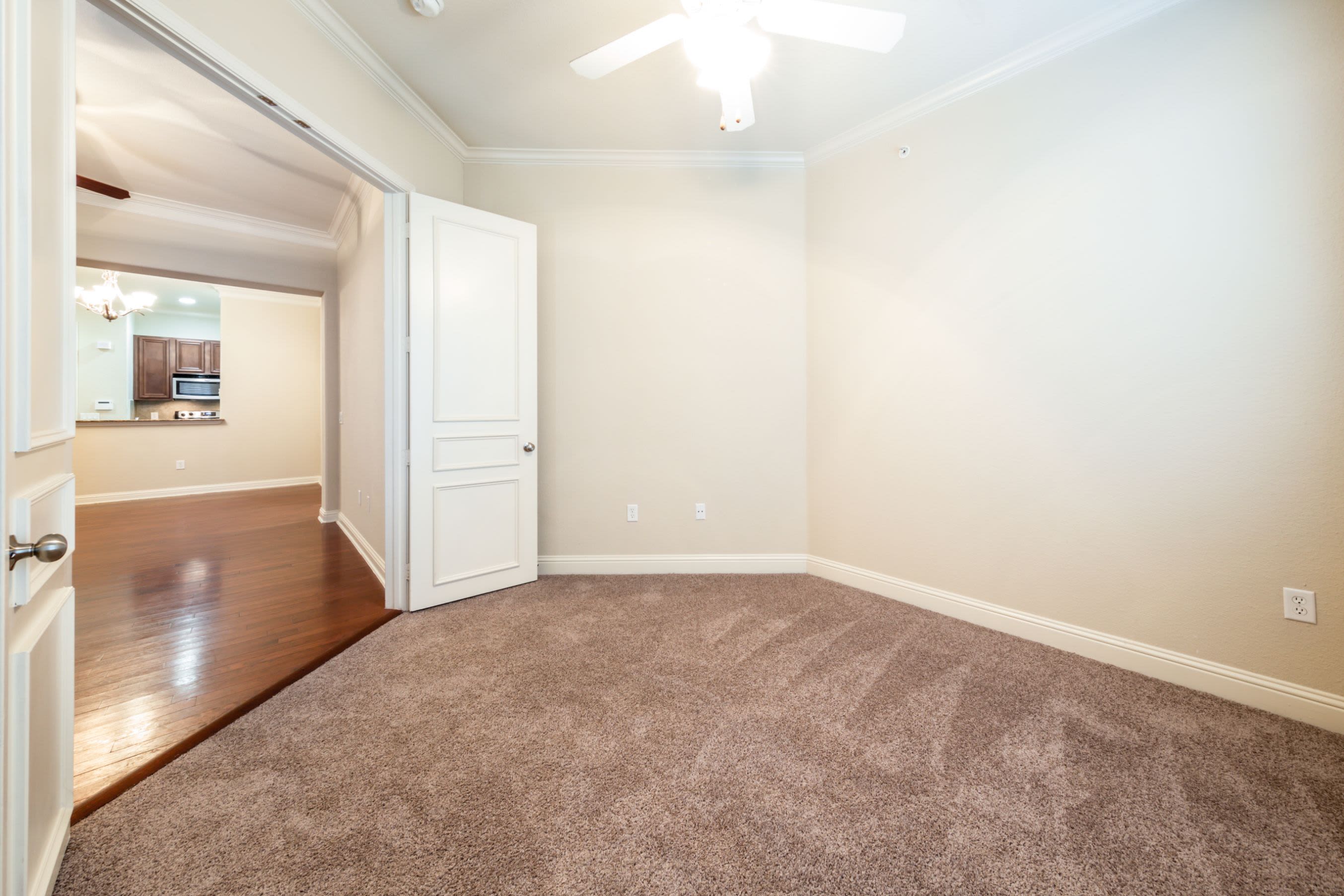 Bedroom with double doors at Marquis at TPC in San Antonio, Texas