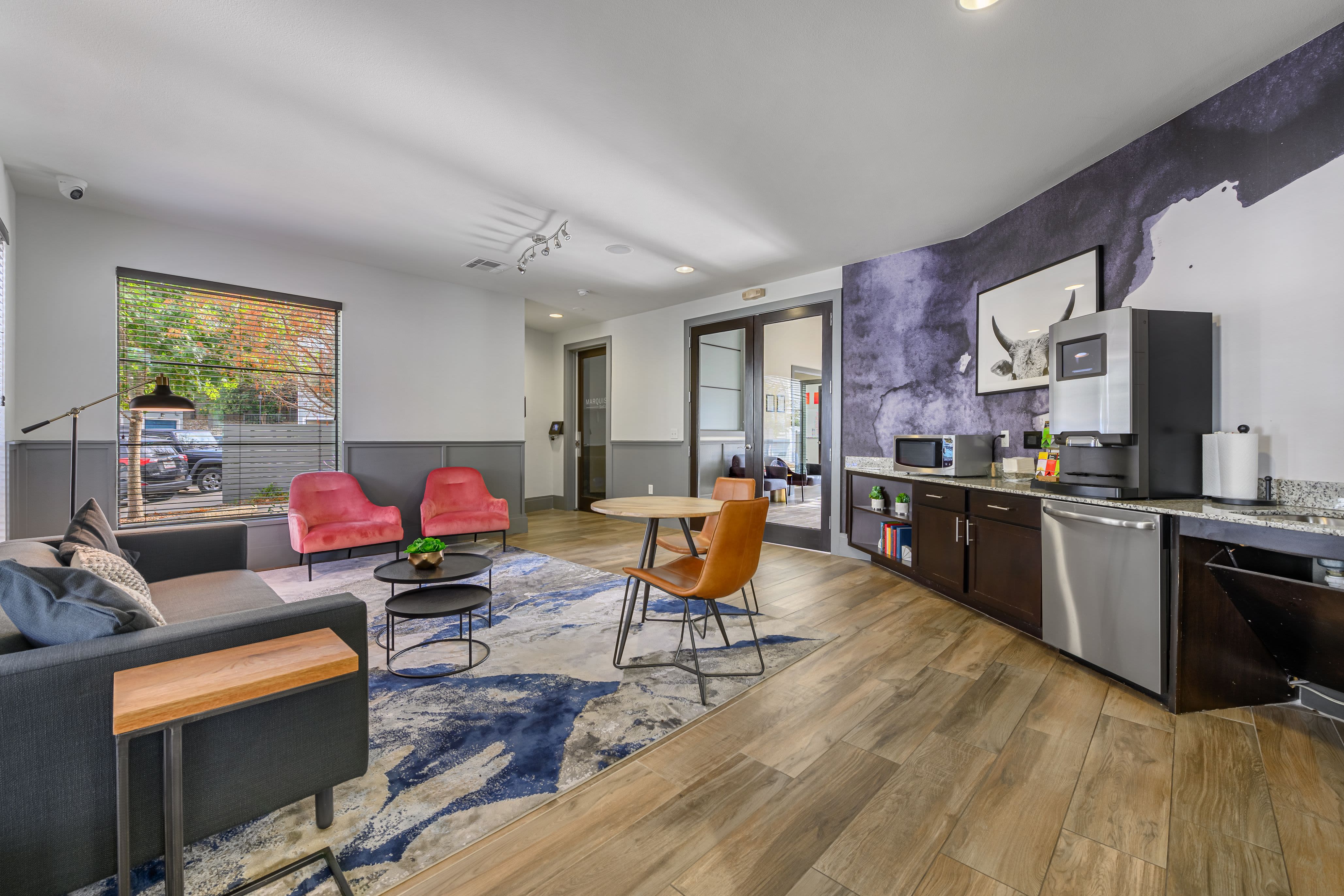 Spacious clubhouse with refreshment bar at Marquis SoCo in Austin, Texas