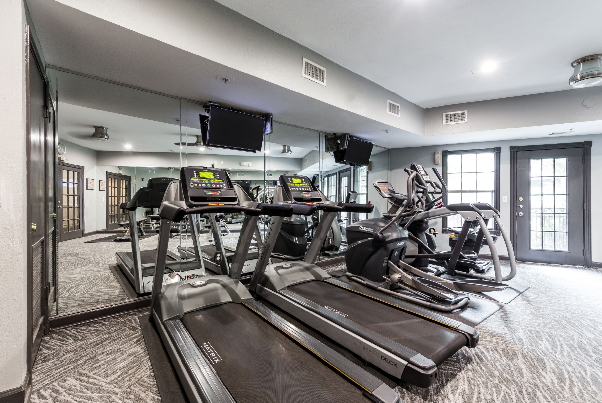 Treadmills in the fitness center at Marquis at Tanglewood in Houston, Texas