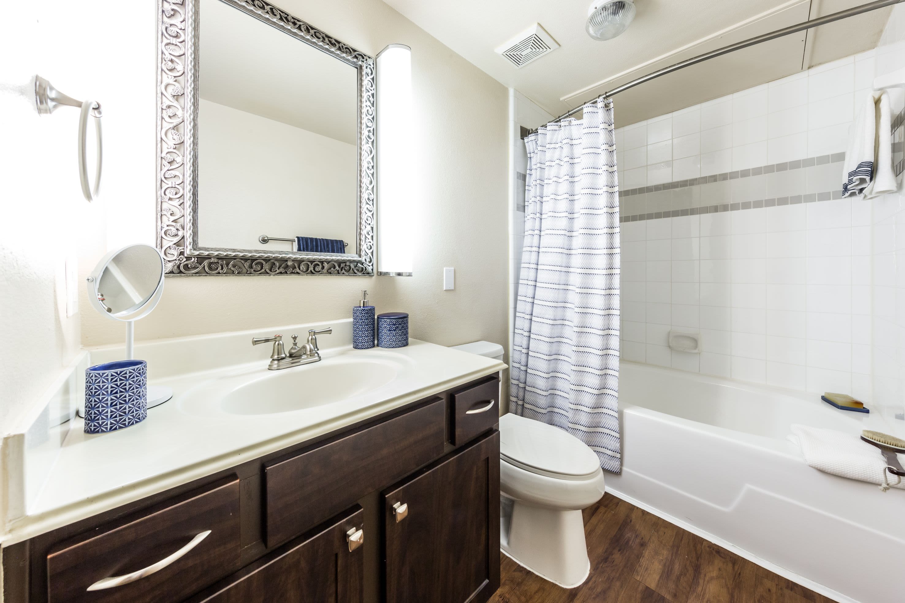 Bathroom with white countertops at Marquis at Tanglewood in Houston, Texas
