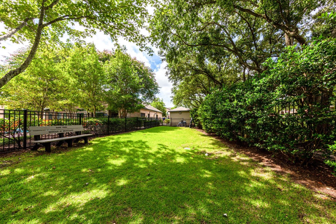 Fenced lawn at Marquis at Westchase in Houston, Texas