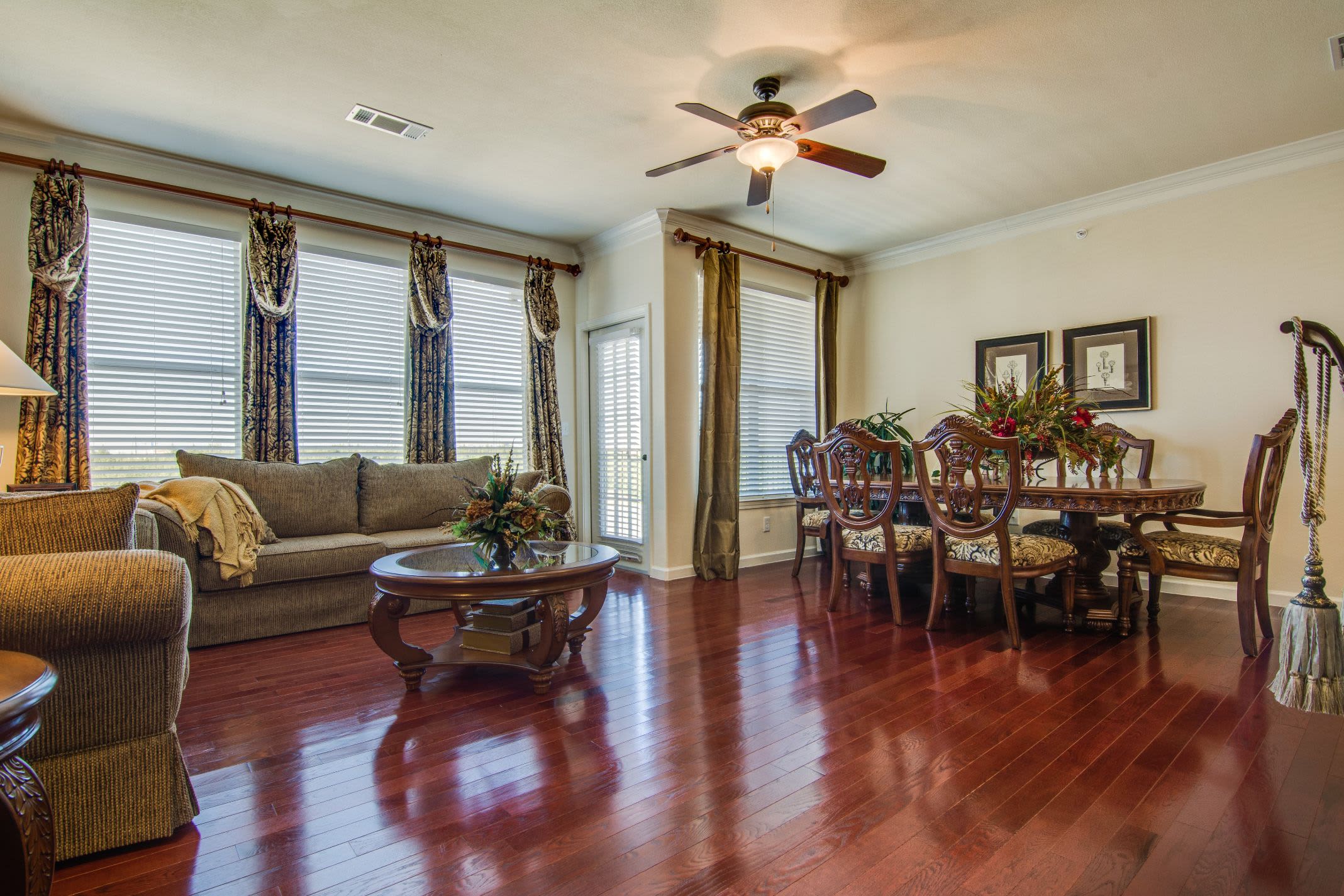 Living area with large windows at Marquis Rockwall in Rockwall, Texas