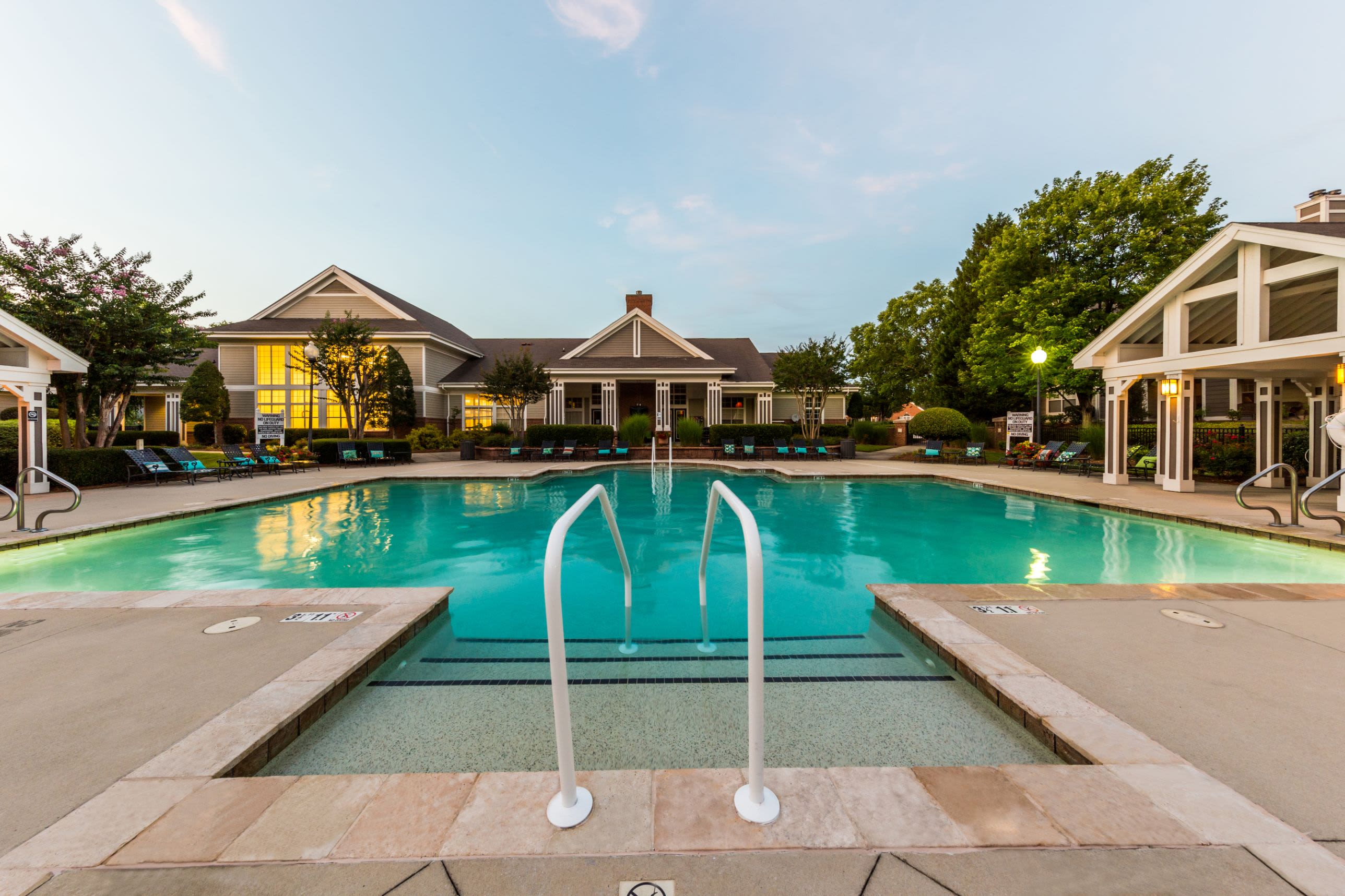 Swimming pool with hand rail at The Preserve at Ballantyne Commons in Charlotte, North Carolina