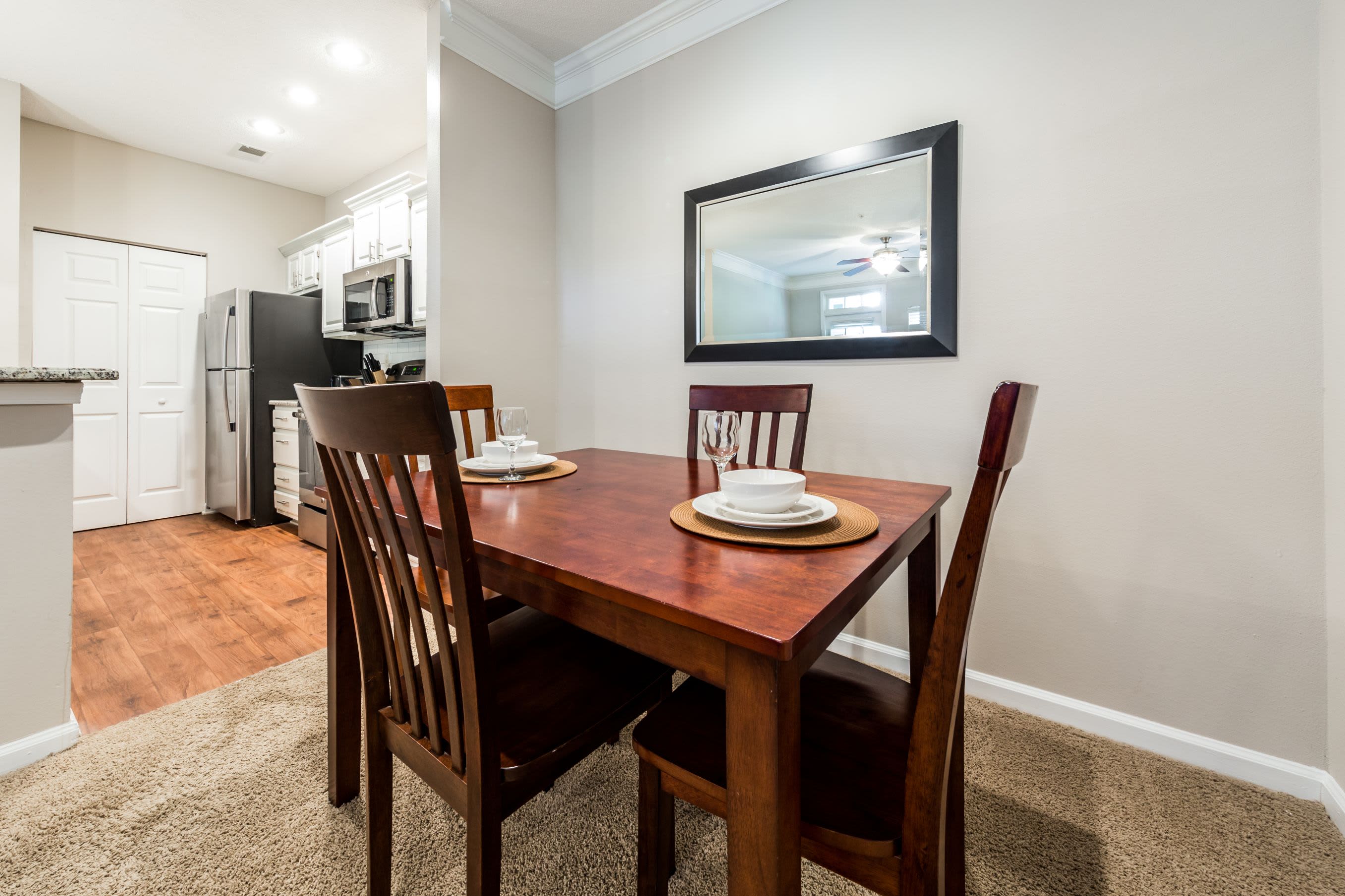 Dining area with carpeted floors at The Preserve at Ballantyne Commons in Charlotte, North Carolina
