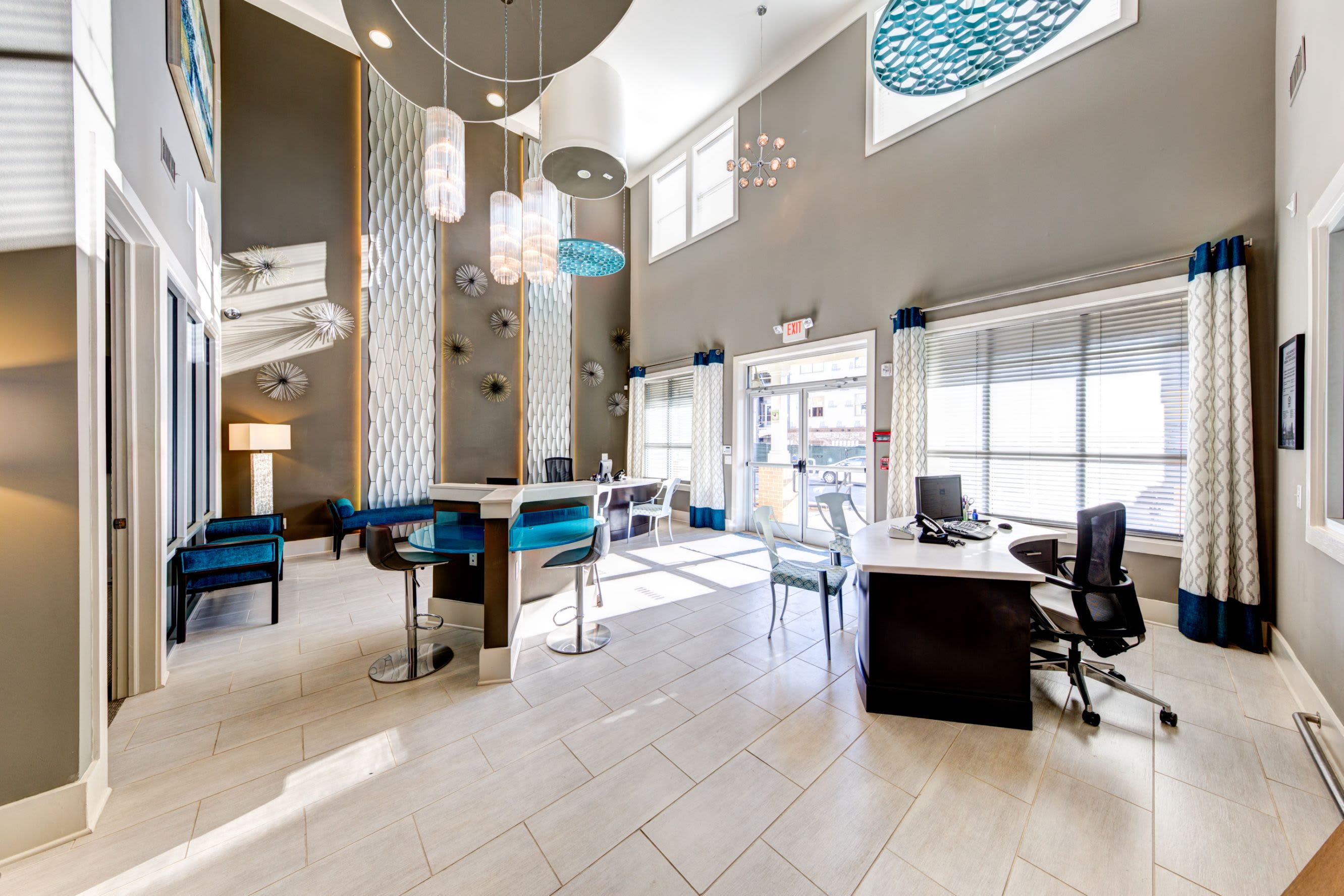Lobby with large windows at Marquis at Morrison Plantation in Mooresville, North Carolina