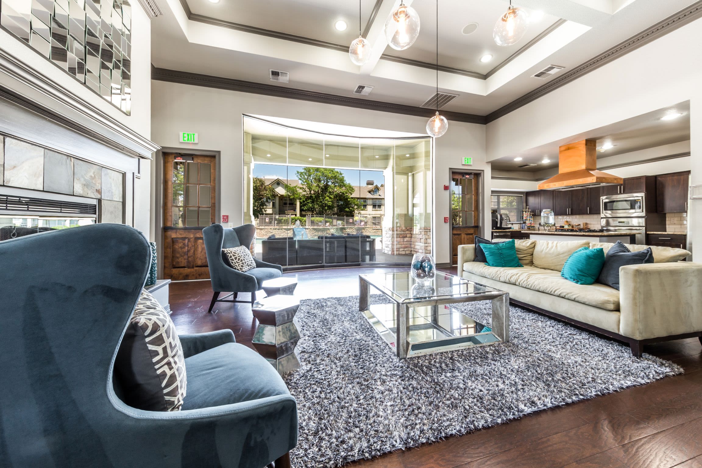 Sitting area and kitchen in clubhouse at Marquis at Town Centre in Broomfield, Colorado