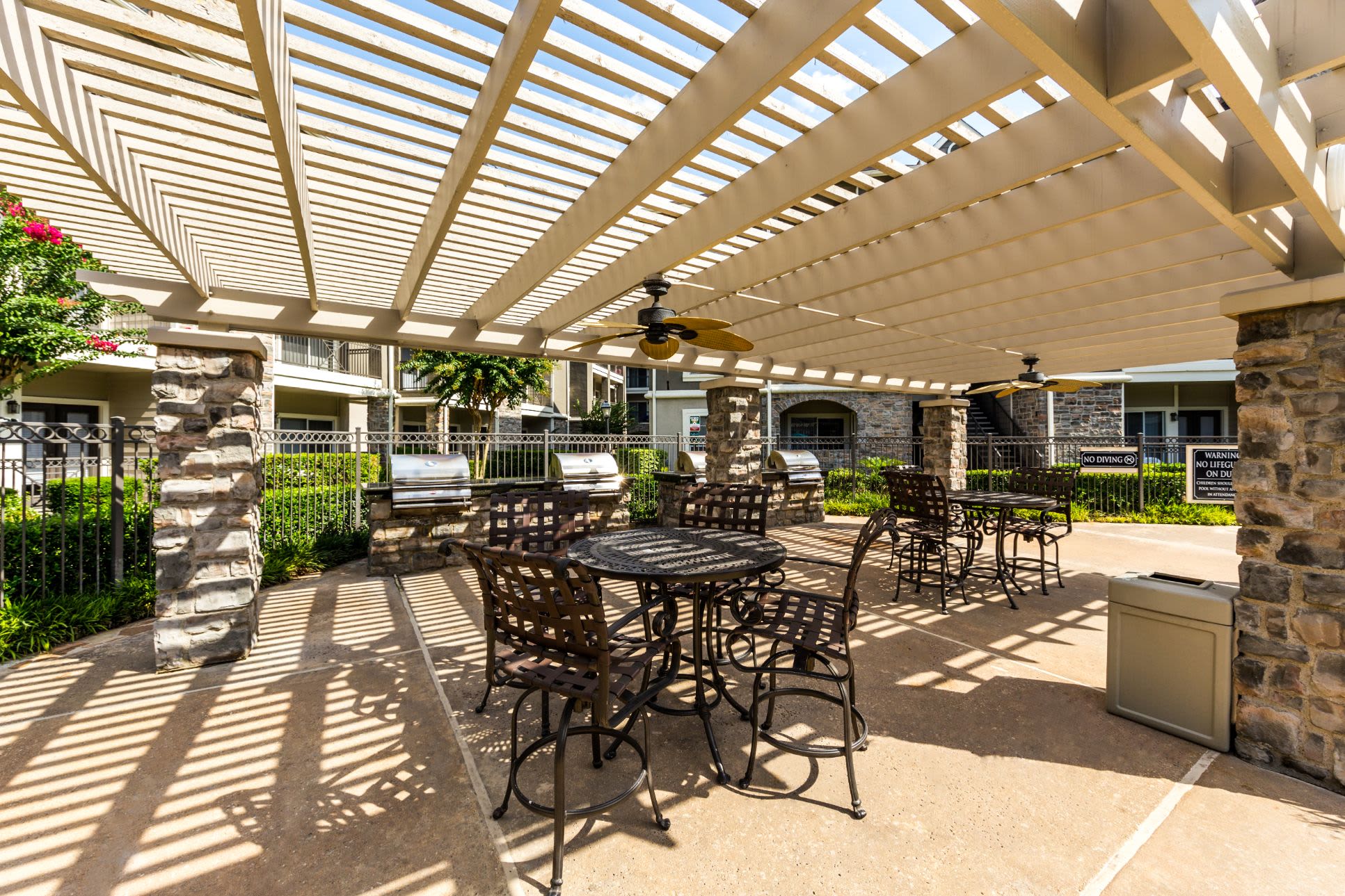 Patio furniture under a gazebo at Marquis on Westheimer in Houston, Texas