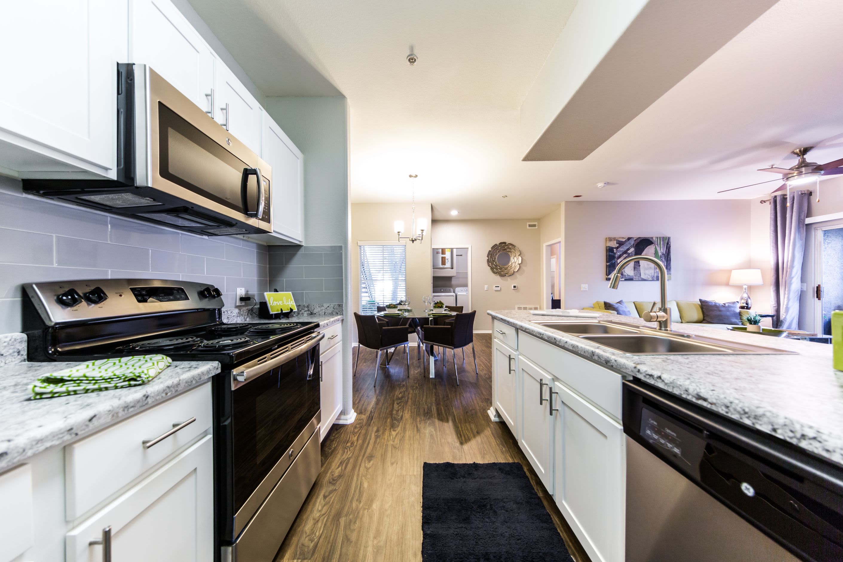 Kitchen with white cabinets at Marquis at Arrowhead in Peoria, Arizona