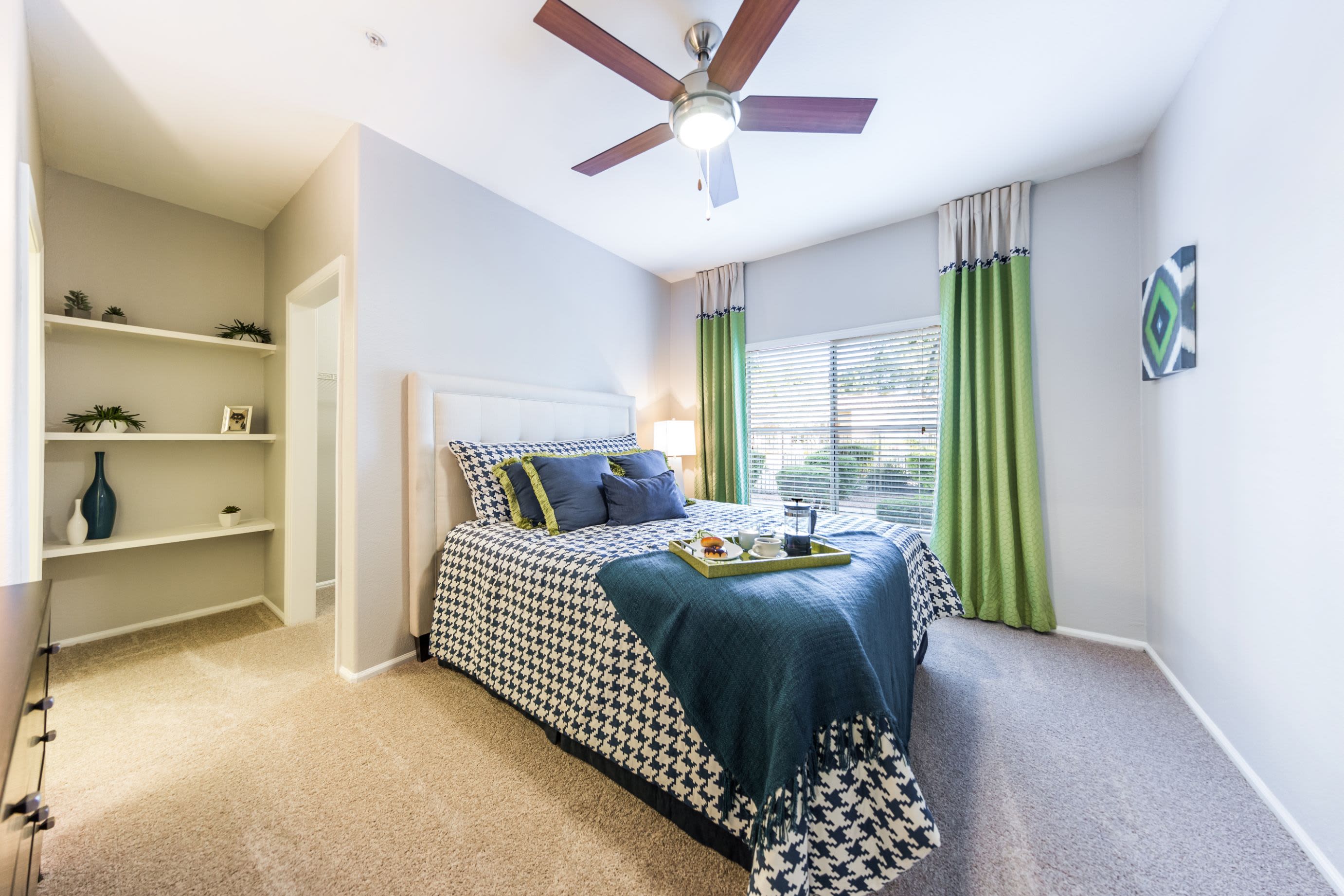 Bedroom with large window at Marquis at Arrowhead in Peoria, Arizona