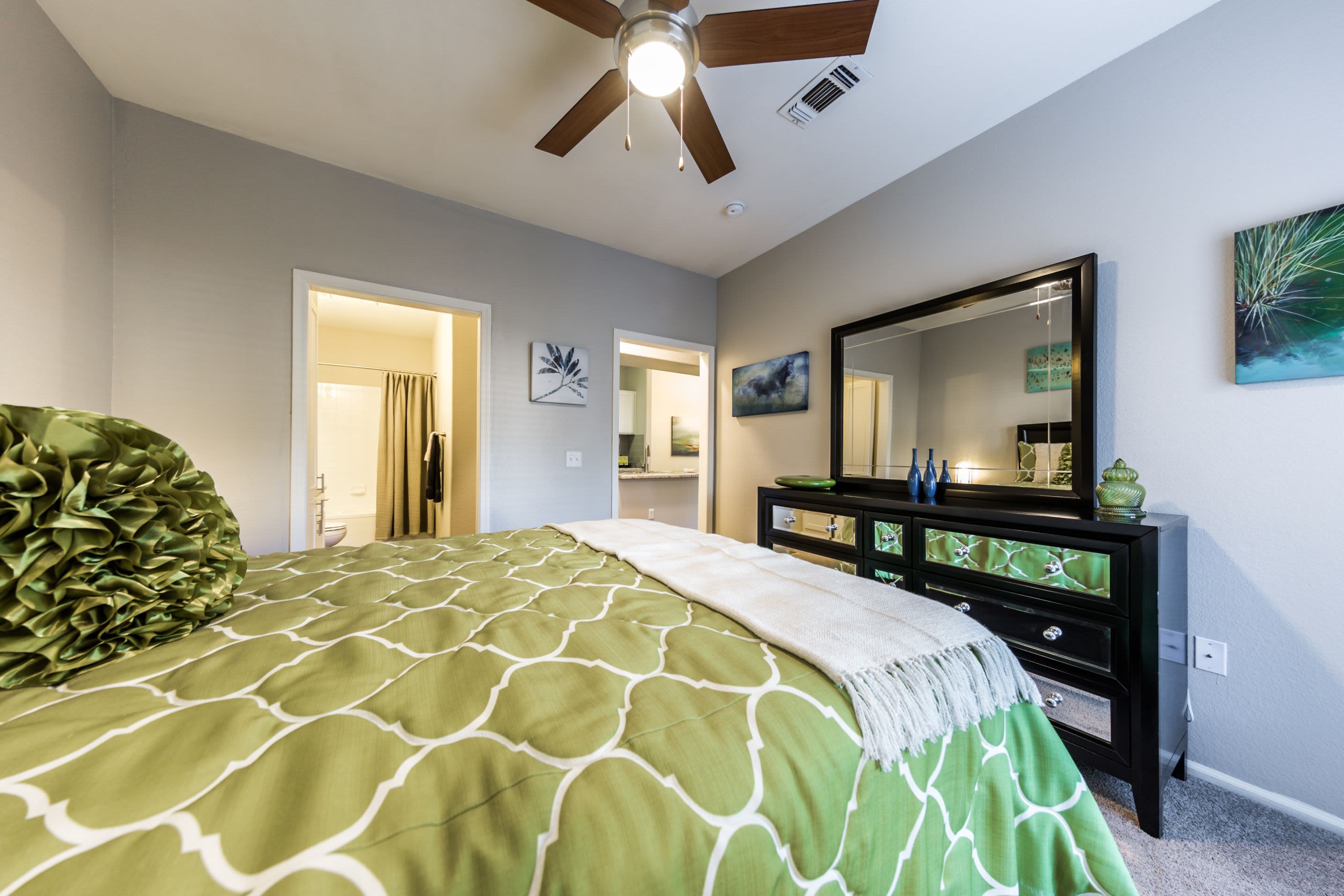 Bedroom with ceiling fan at Marquis at Arrowhead in Peoria, Arizona