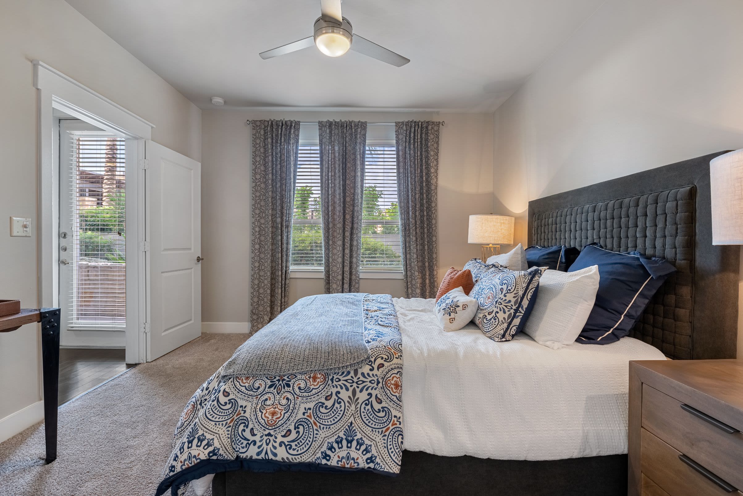 Bedroom with large window at Marquis Cresta Bella in San Antonio, Texas
