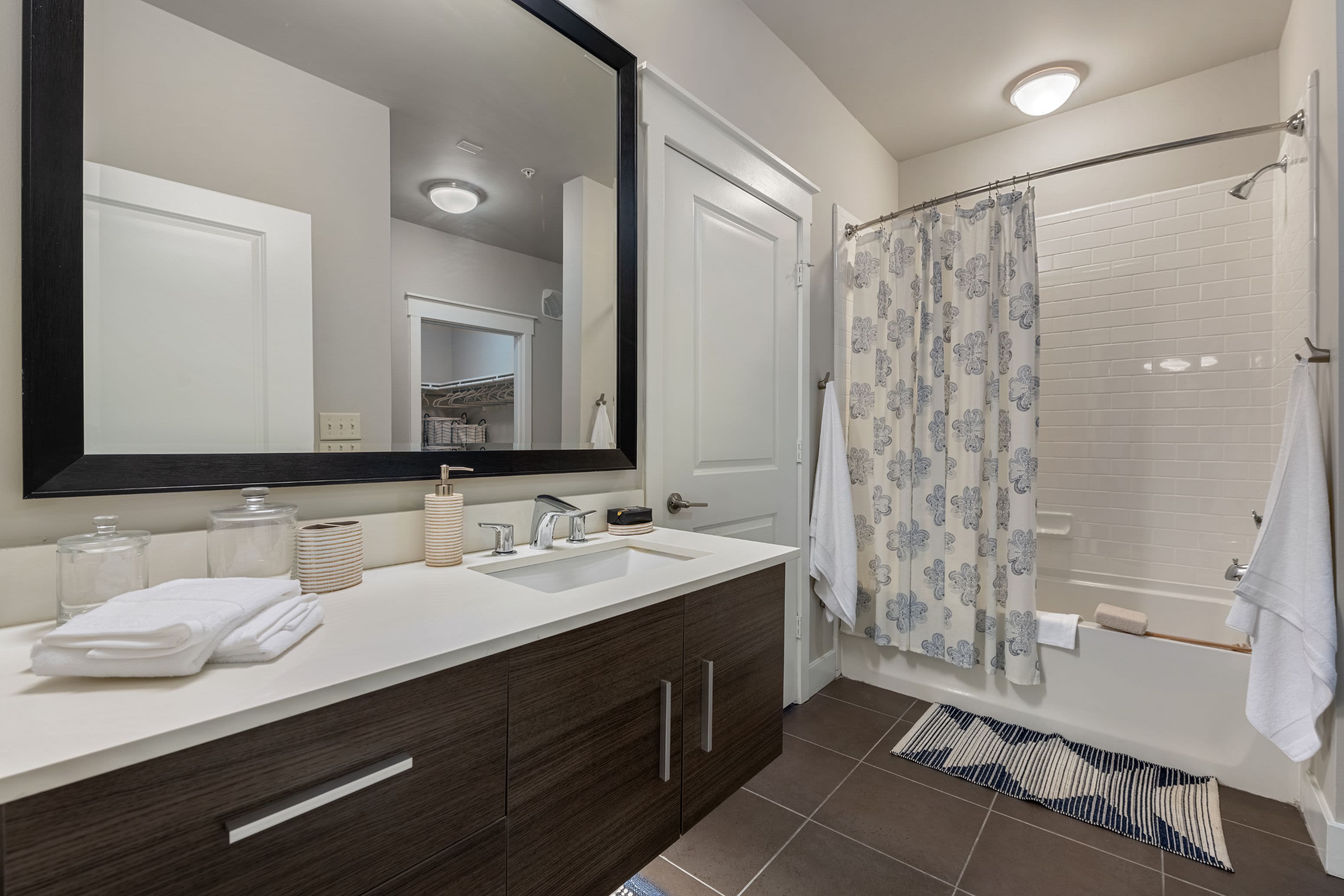 Bathroom with white countertops at Marquis Cresta Bella in San Antonio, Texas