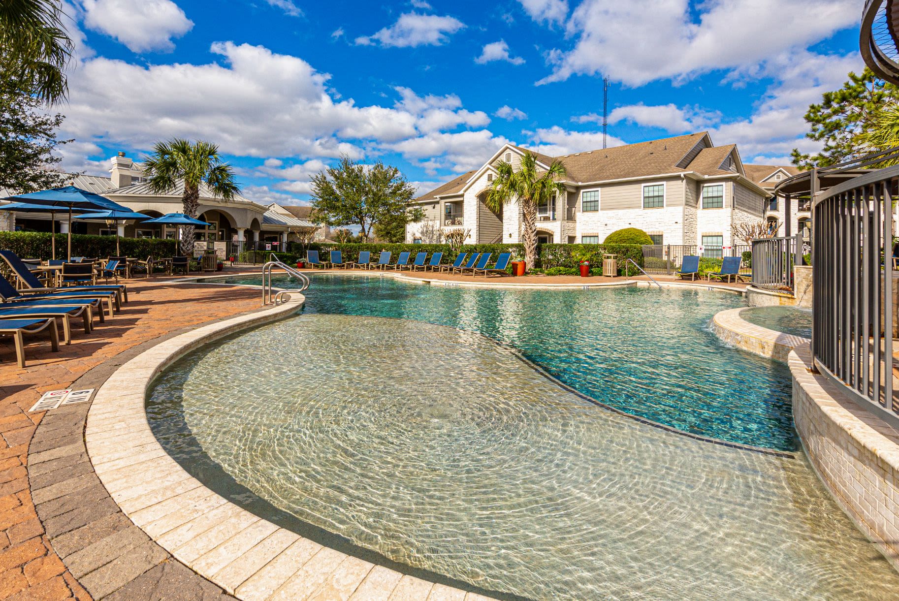 Sparkling swimming pool at Marquis Grand Lakes in Richmond, Texas