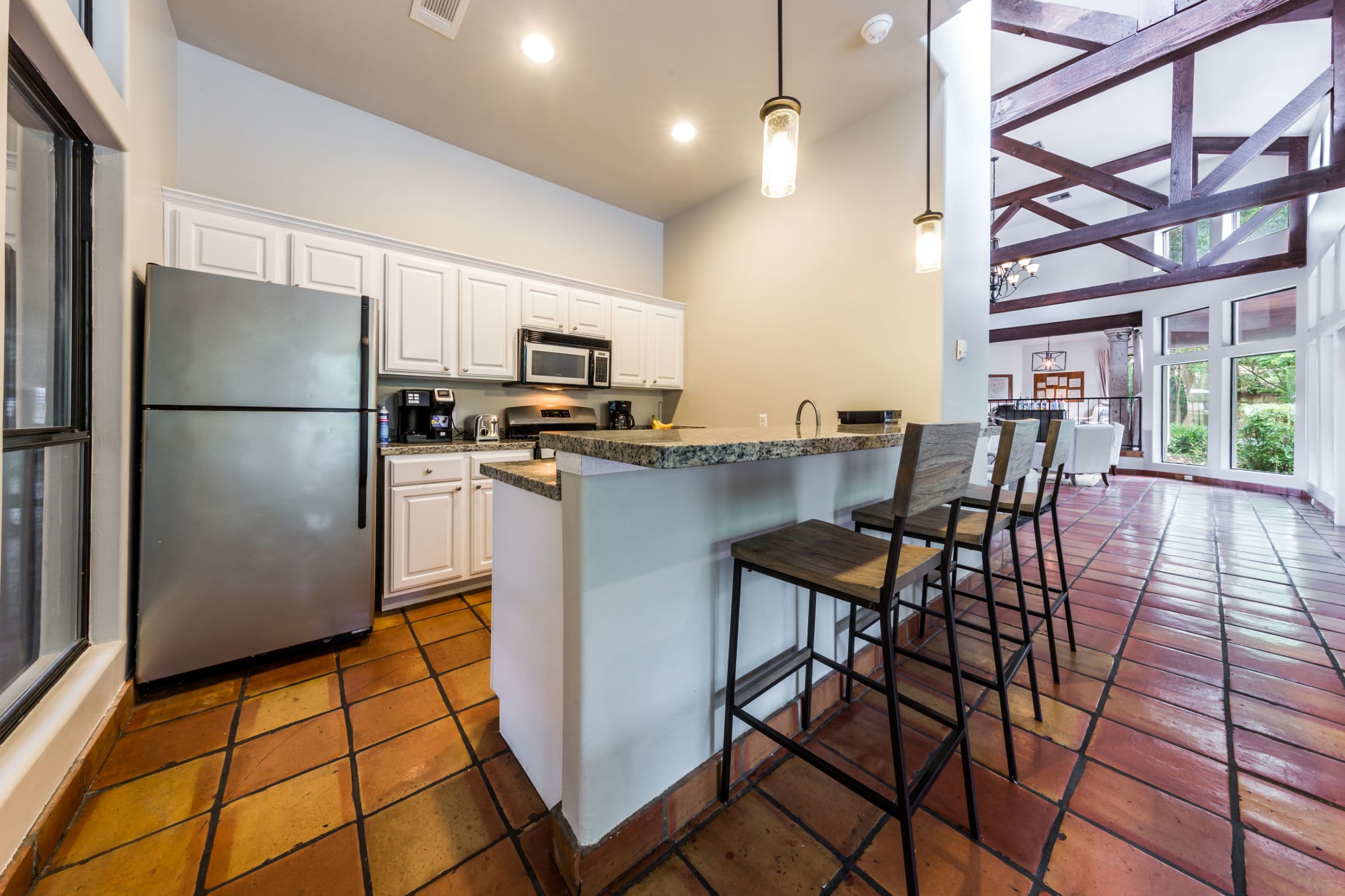 Kitchen and breakfast bar in clubhouse at Marquis at Caprock Canyon in Austin, Texas