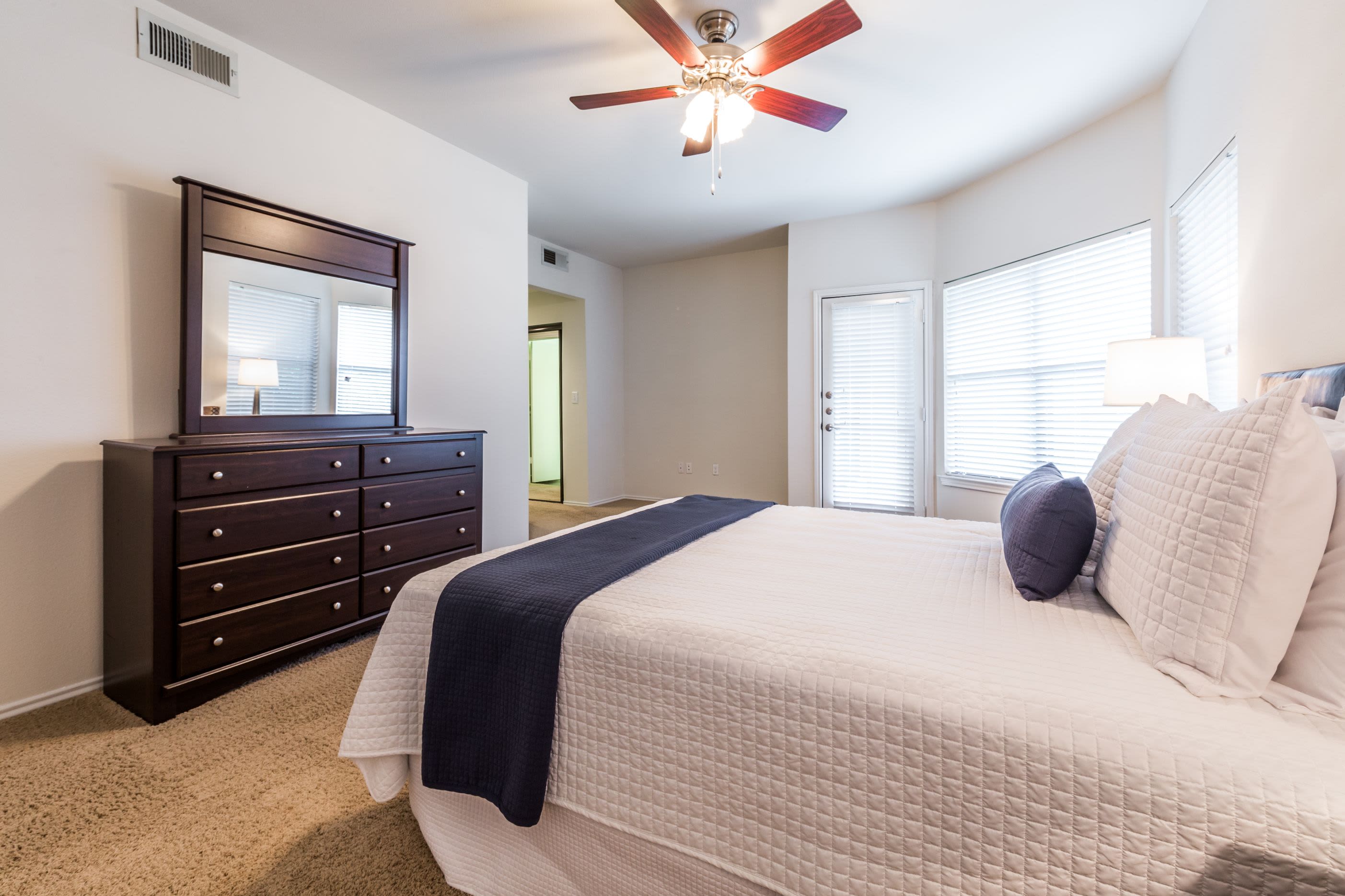 Bedroom with ceiling fan at Marquis at Caprock Canyon in Austin, Texas