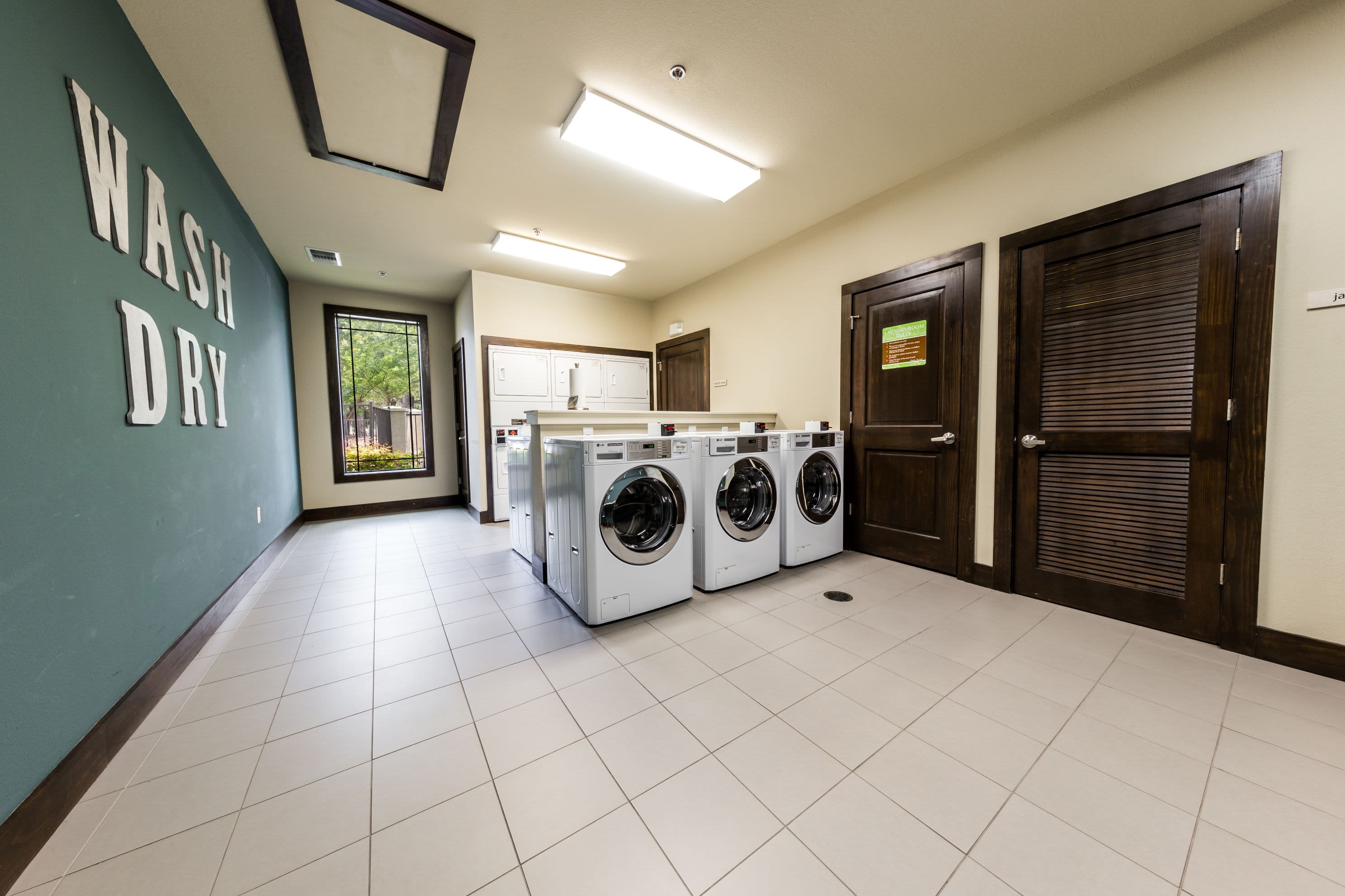 Laundry room at Marquis on Lakeline in Cedar Park, Texas