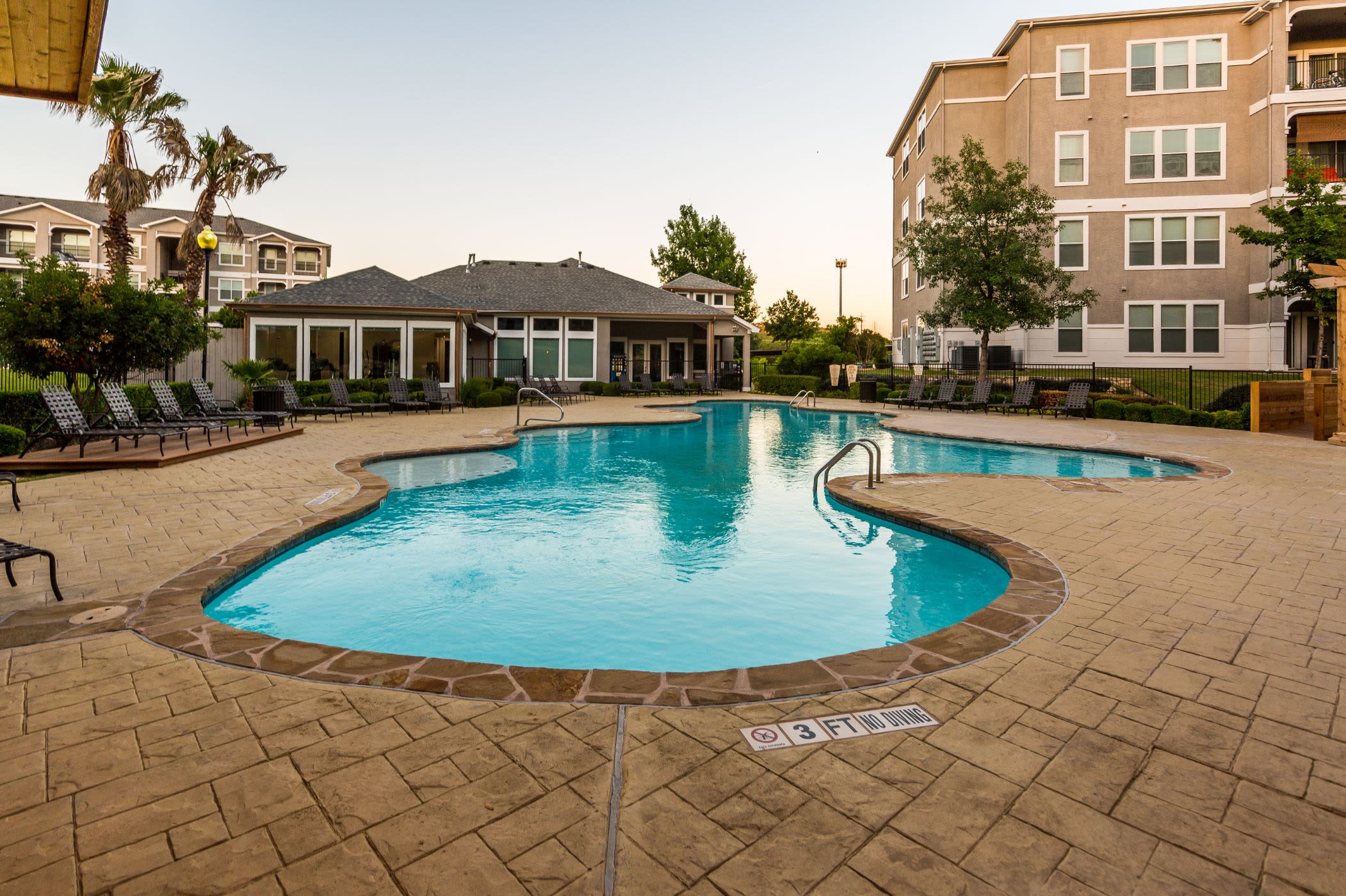 Swimming pool outside of the clubhouse at Marquis at Crown Ridge in San Antonio, Texas