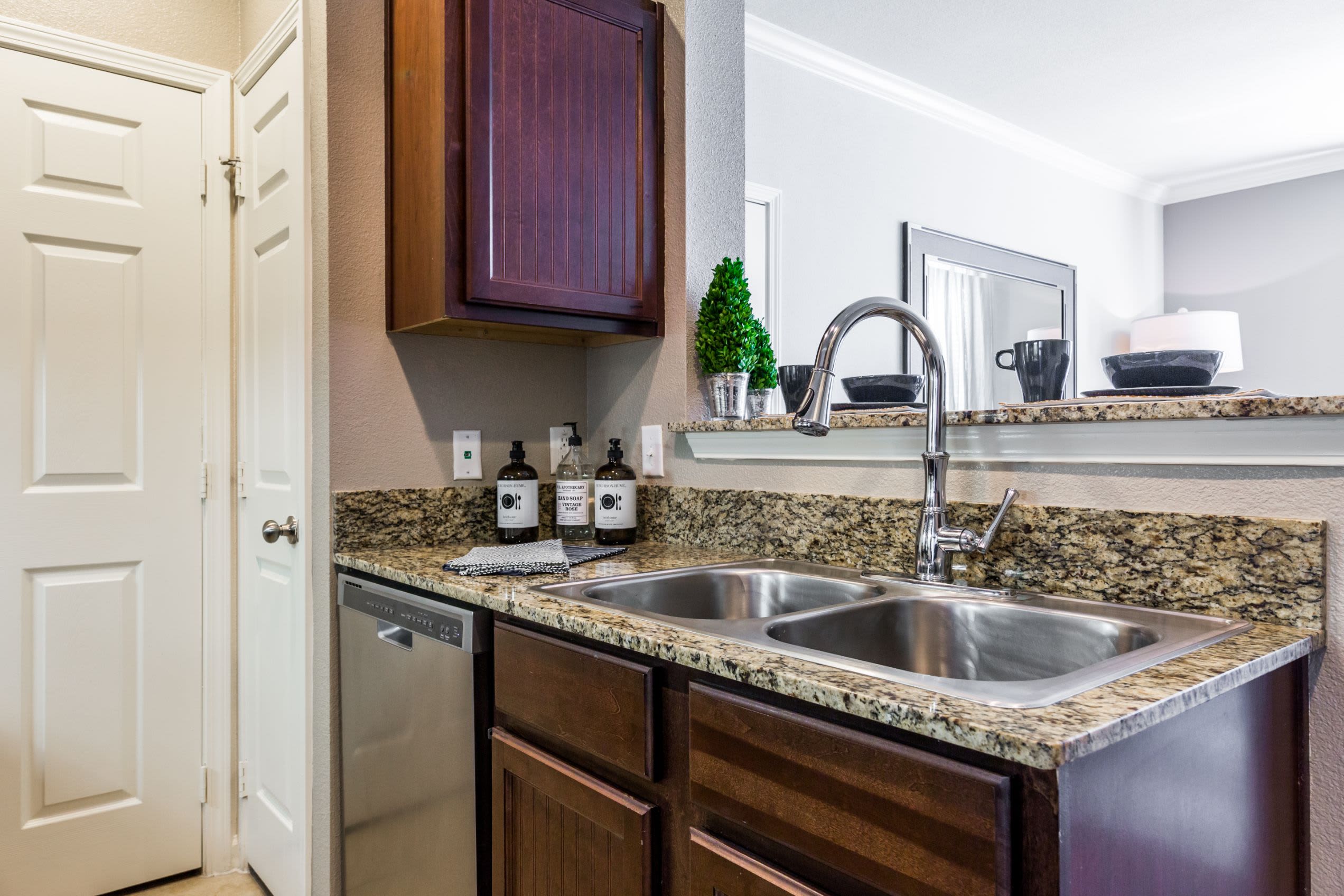 Double sided kitchen sink at Marquis at Crown Ridge in San Antonio, Texas