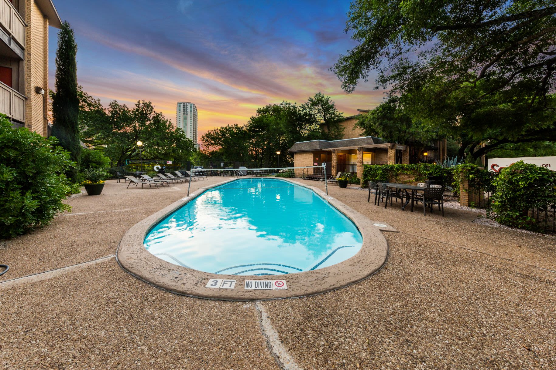 Community pool at sunset at SoCo on The Lake in Austin, Texas