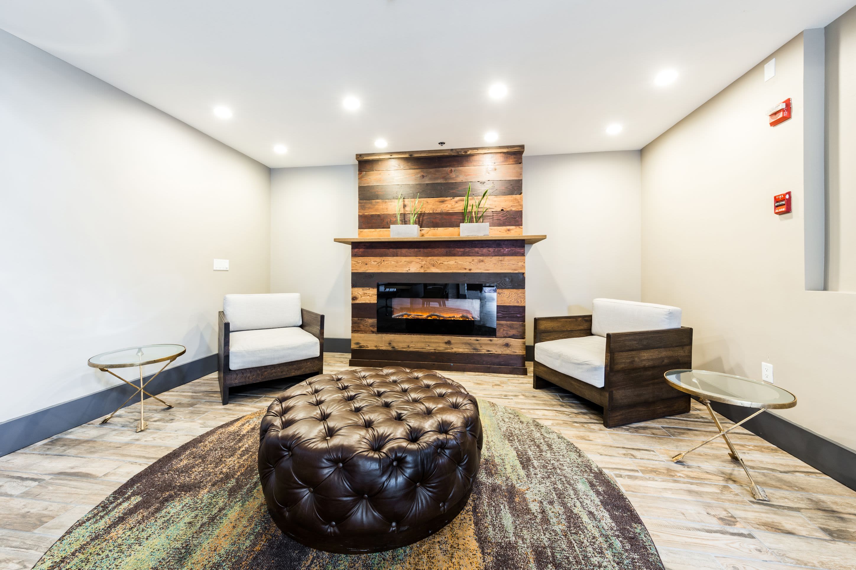 Indoor lounge with fireplace at Marq 211 in Seattle, Washington