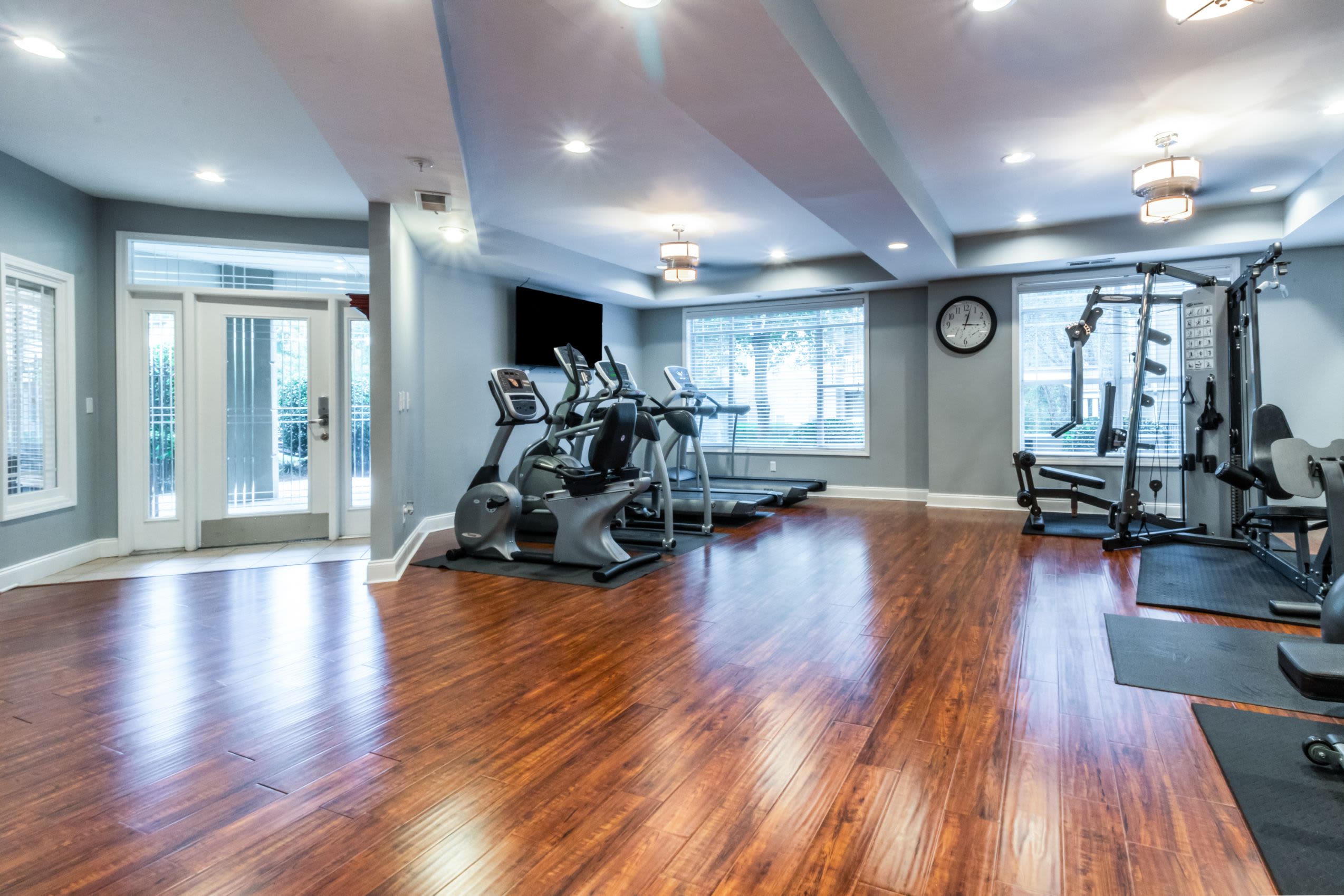 Bright fitness center with wood floors at Marquis Midtown West in Atlanta, Georgia-
