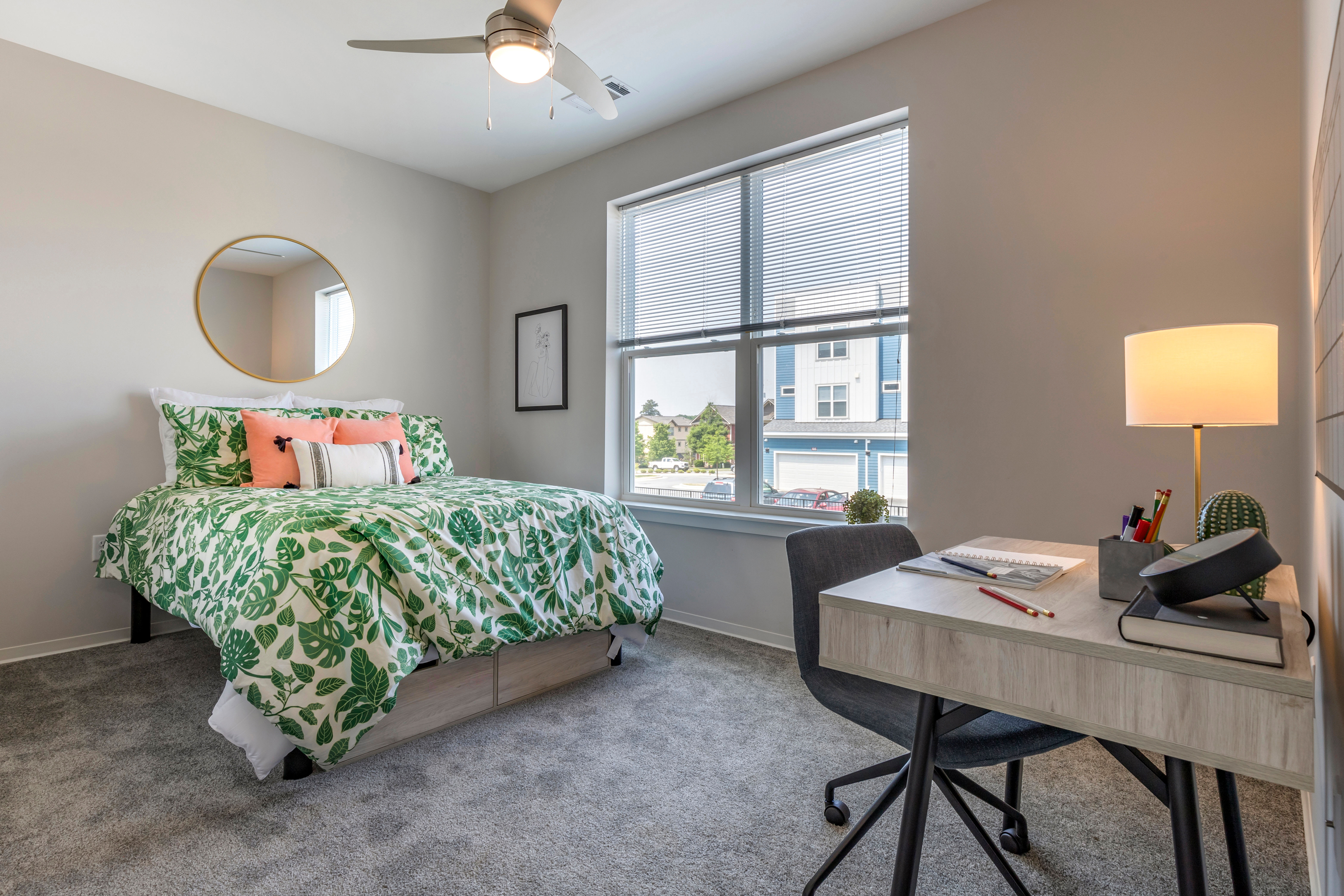 Well decorated bedroom at LATITUDE on Hillsborough in Raleigh, North Carolina