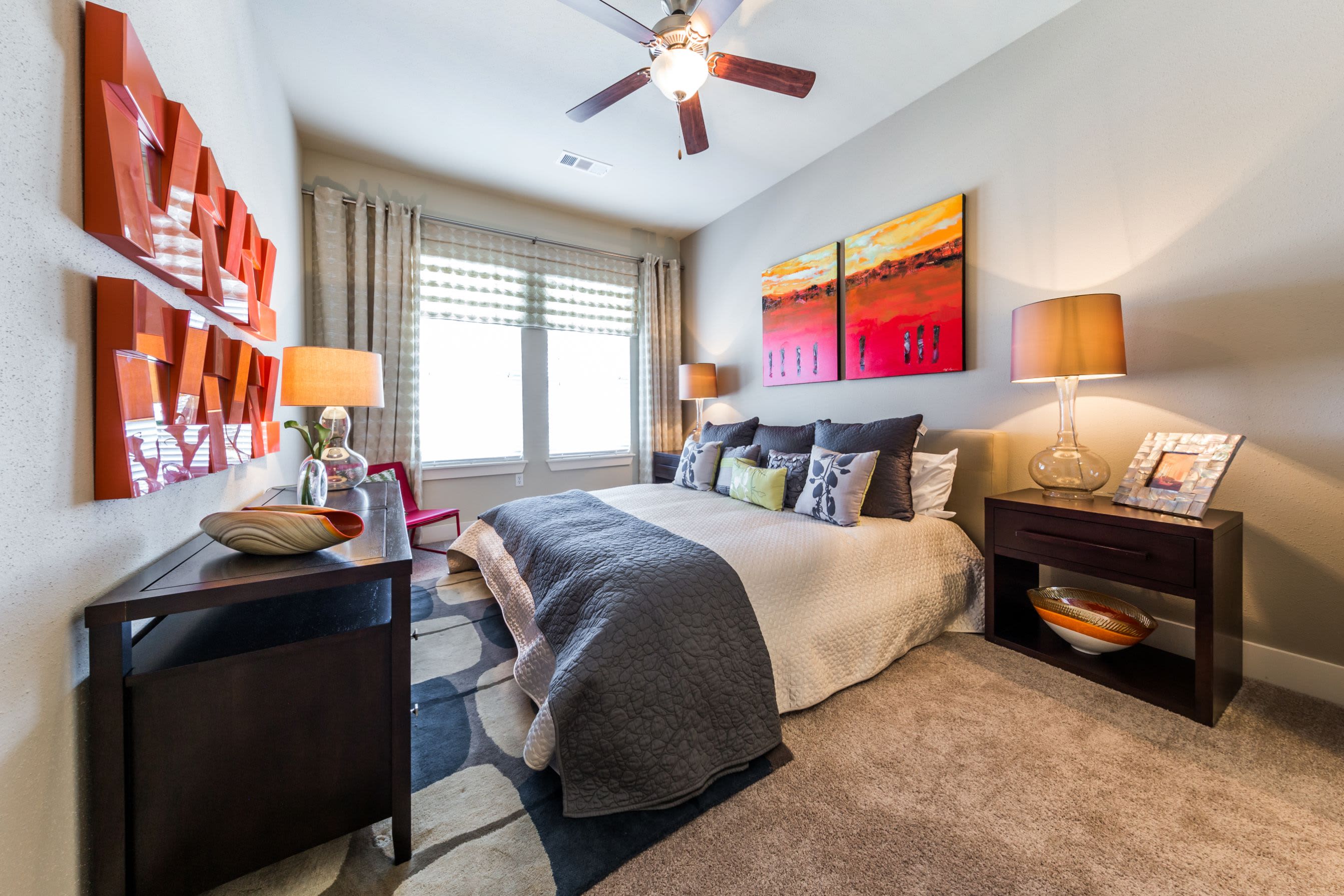 Spacious bedroom with a ceiling fan at The Marq at Ridgegate in Lone Tree, Colorado