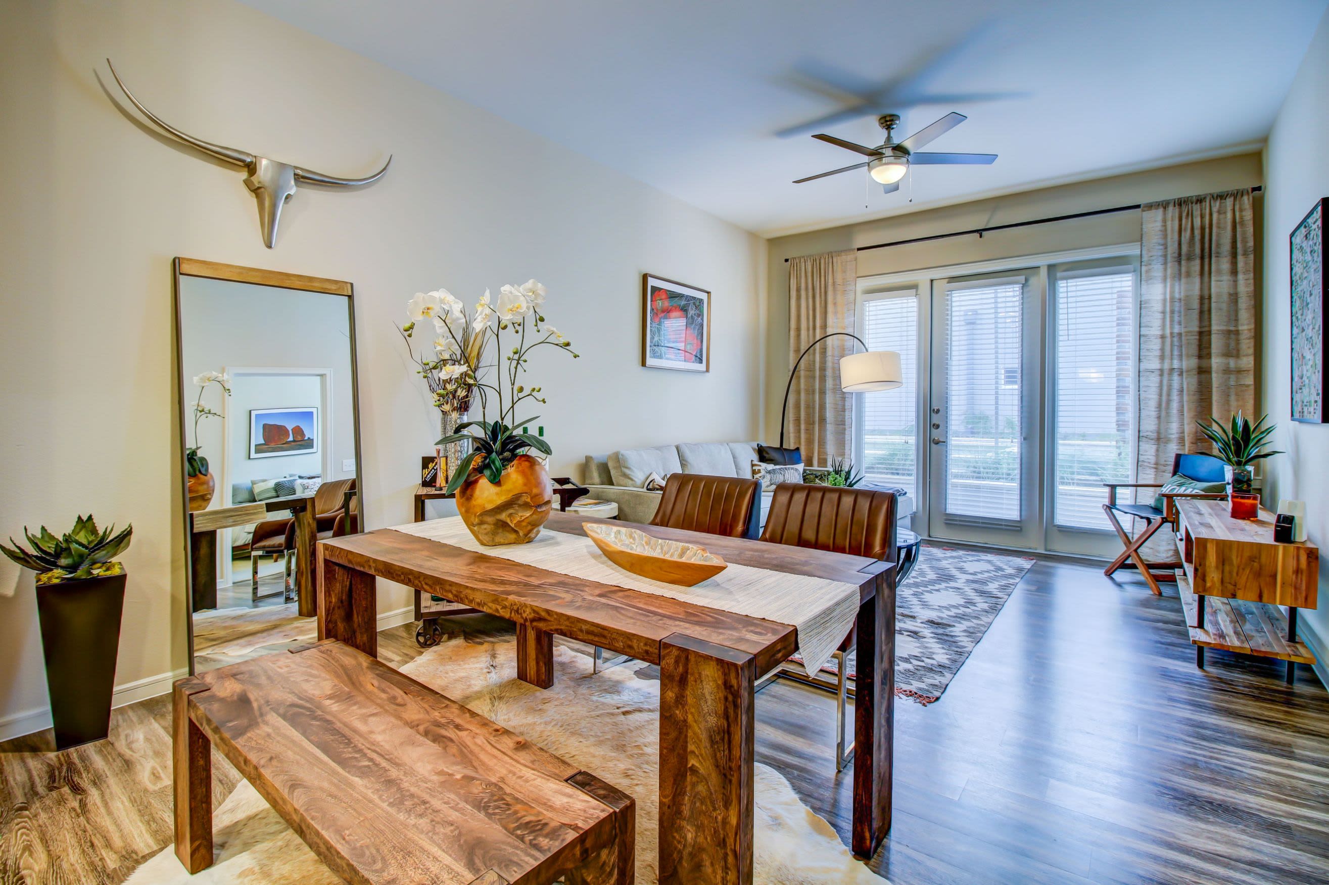 Open dining area with wood floors at Westerly 360 in Austin, Texas