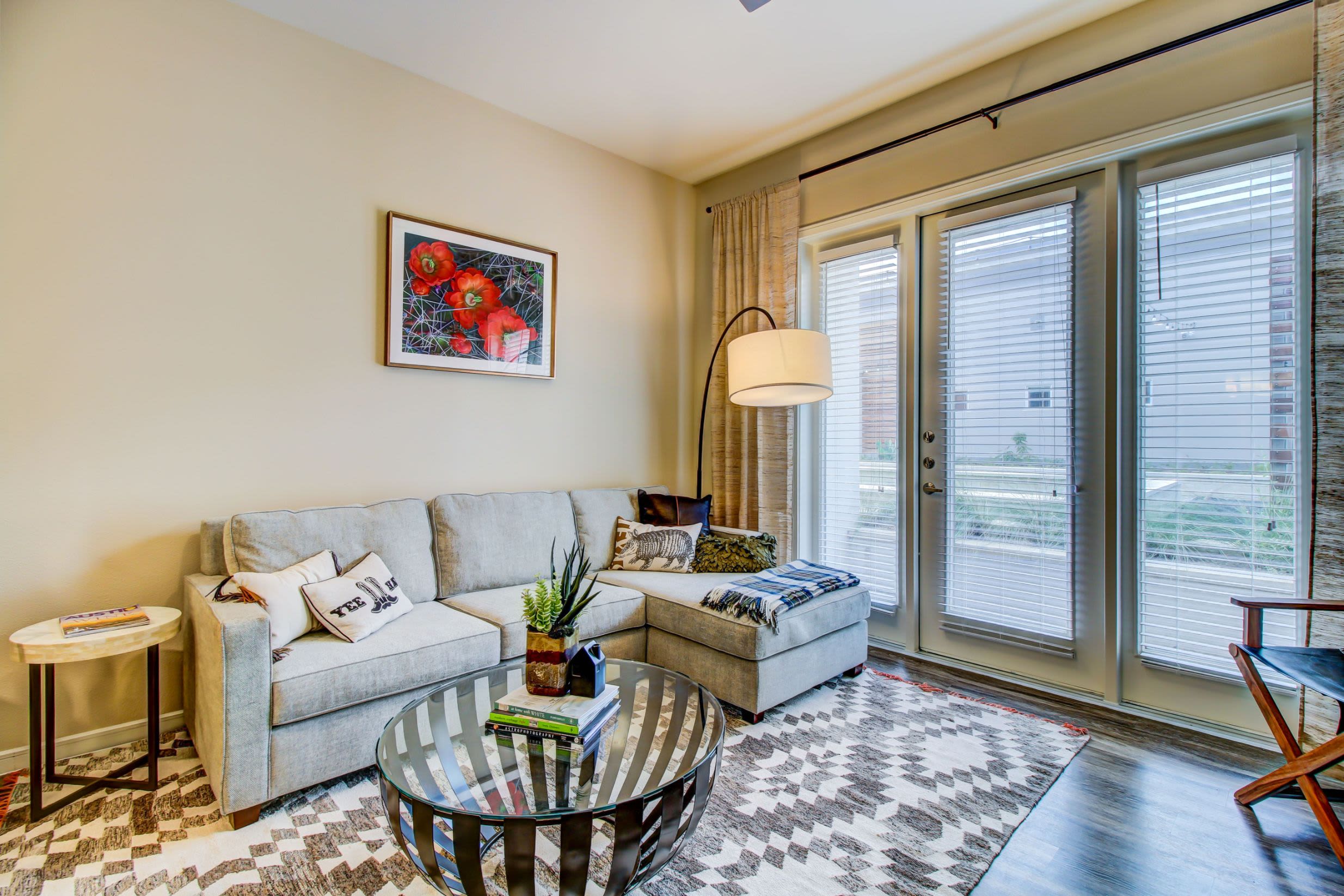 Spacious living room with French doors at Westerly 360 in Austin, Texas