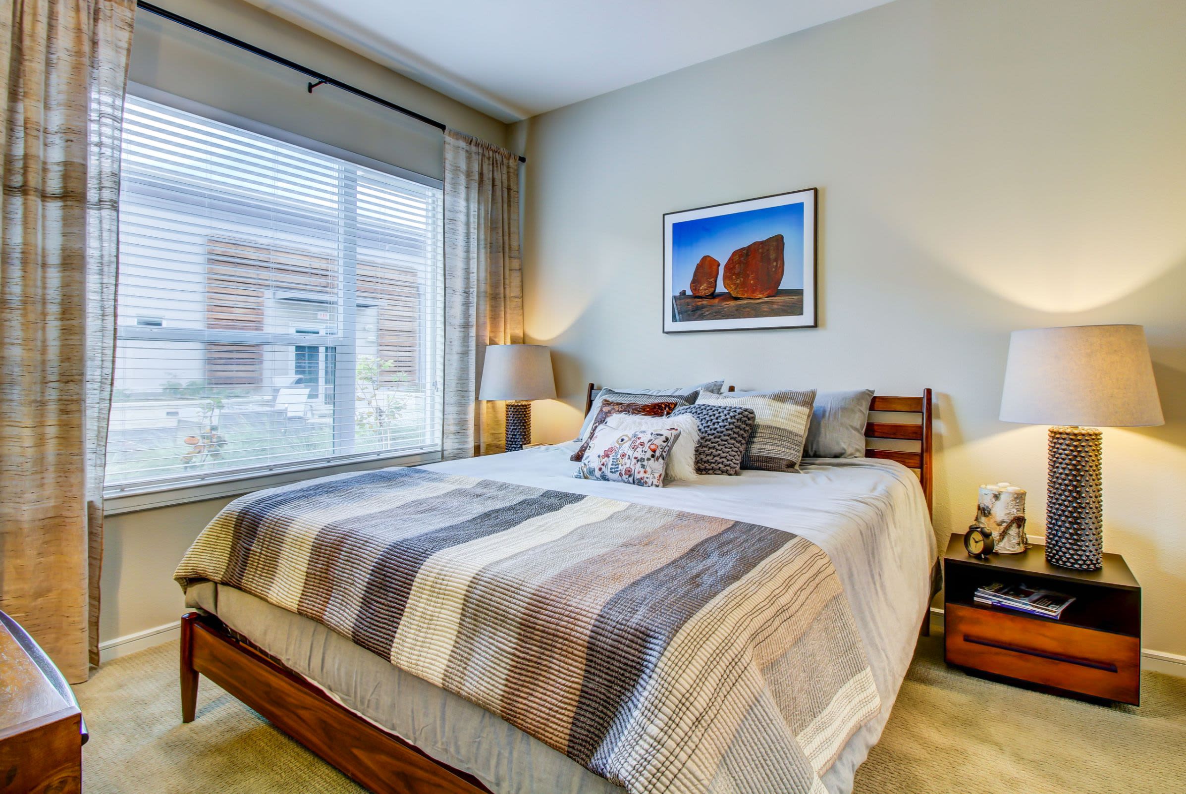 Bright bedroom with a large window at Westerly 360 in Austin, Texas