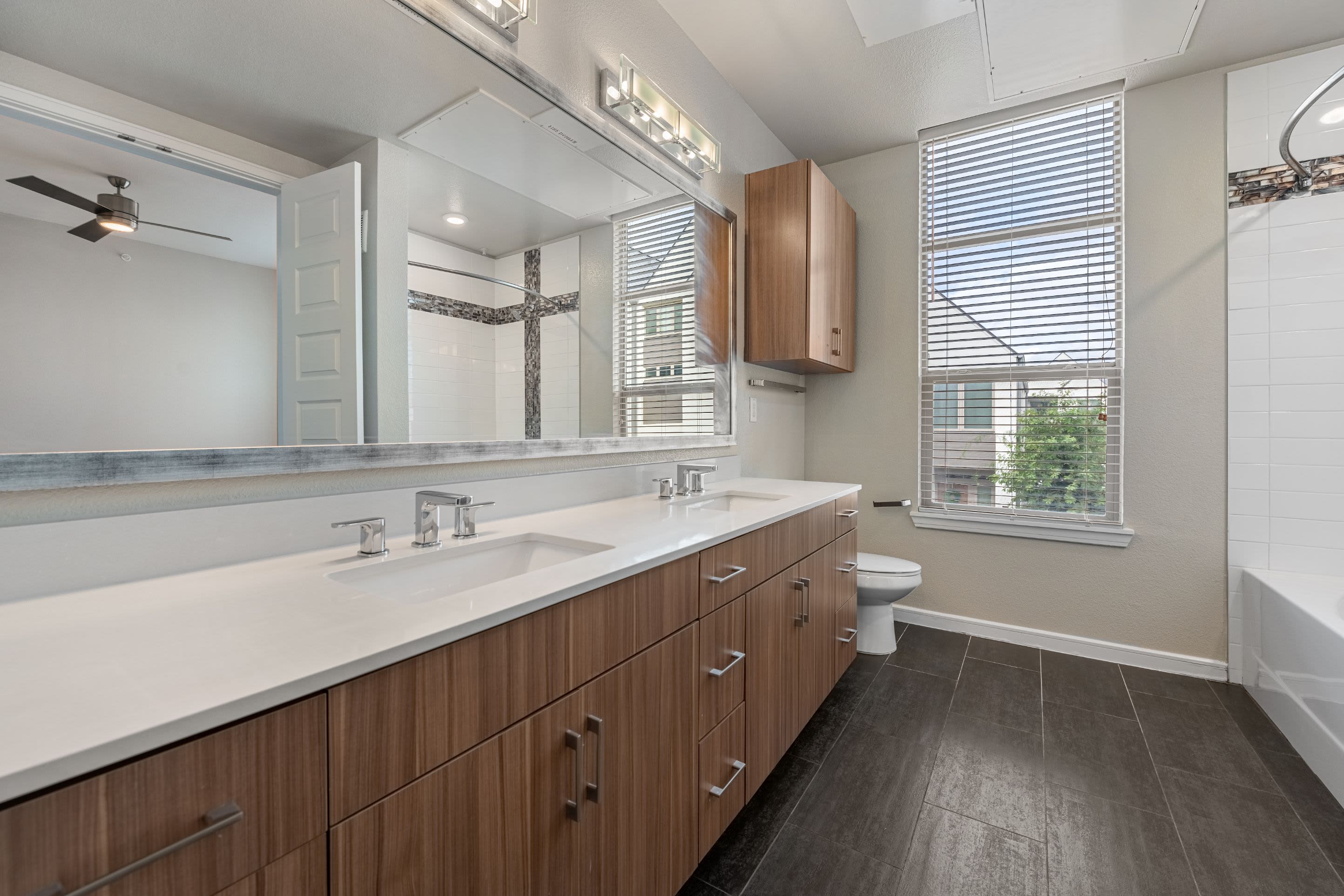 Large bathroom with double sinks at Westerly 360 in Austin, Texas