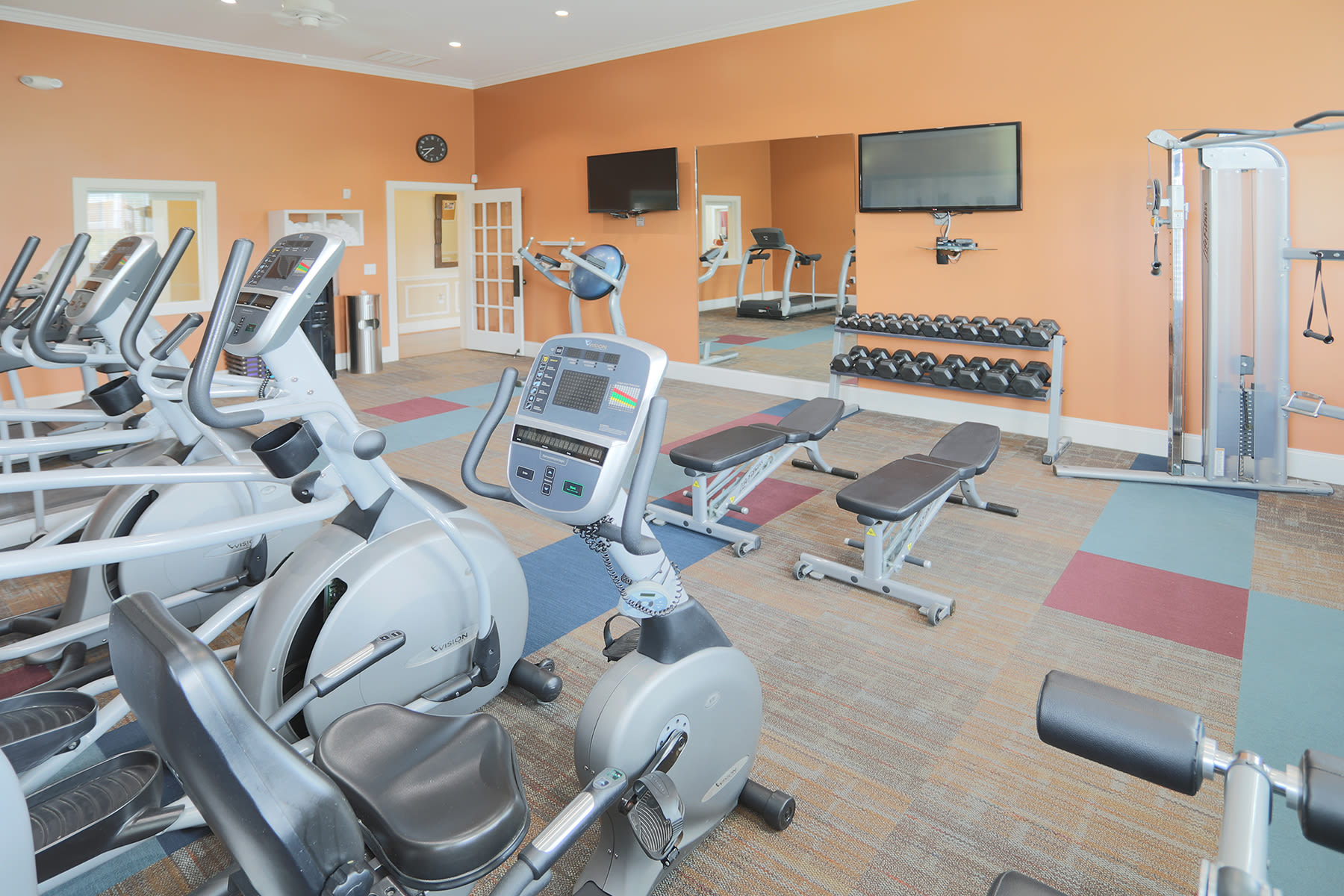 Fitness center at Brinley Place Apartments