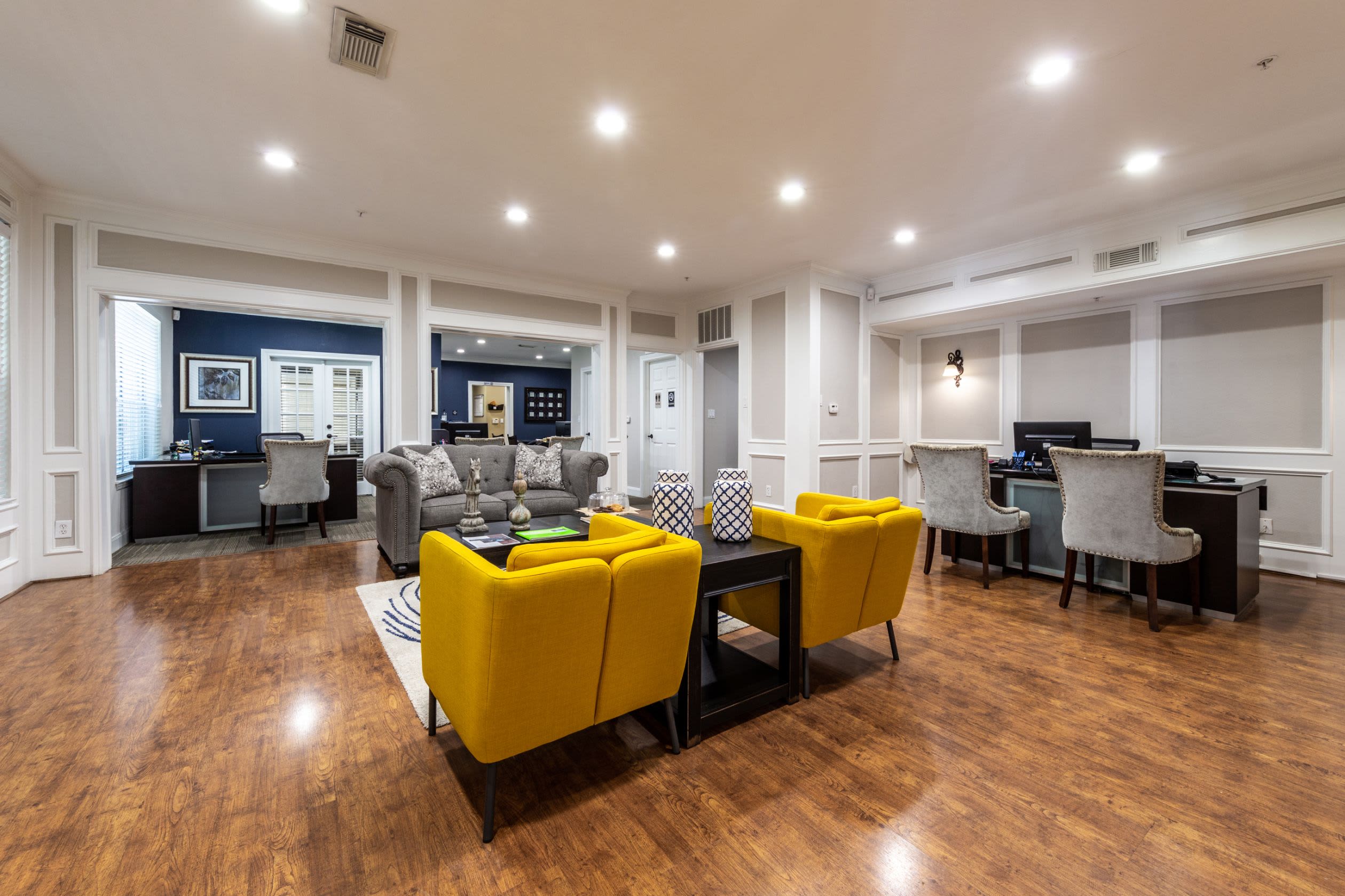 Spacious clubhouse with wood floors at Marquis on Pin Oak in Houston, Texas