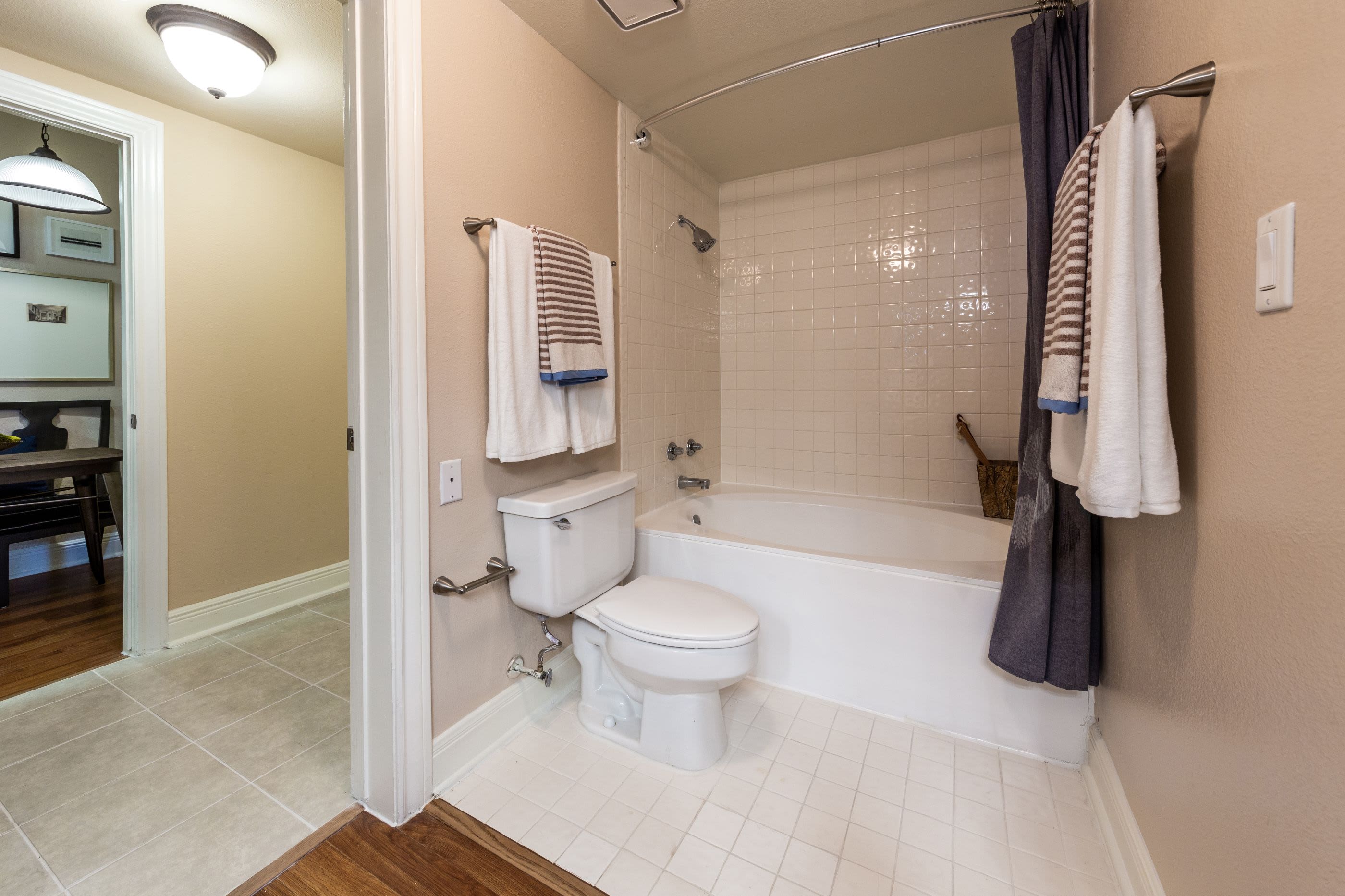 Bathroom with a tub and a shower at Marquis on Pin Oak in Houston, Texas