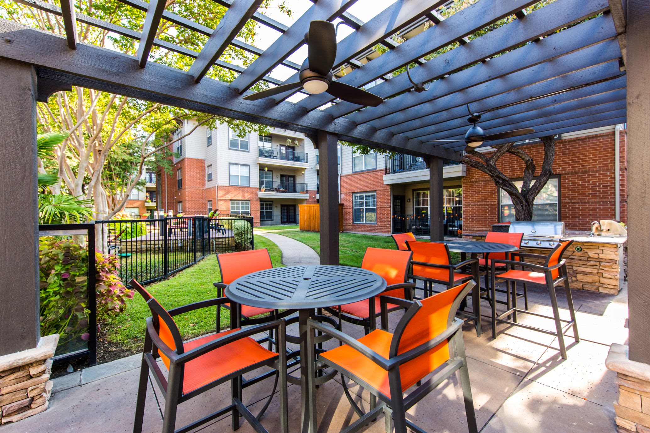 Table and chairs under a gazebo at Marquis on Gaston in Dallas, Texas
