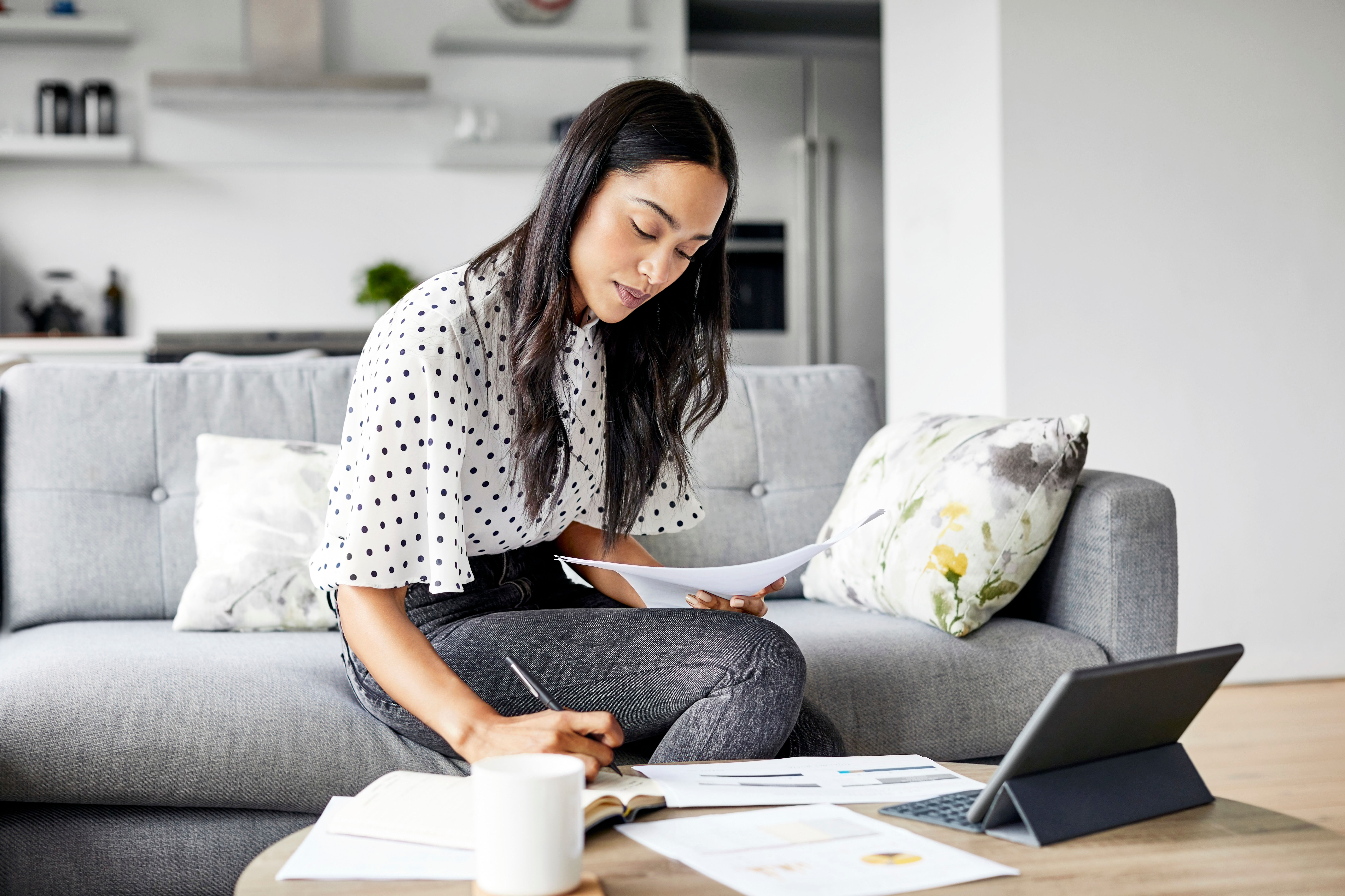 Woman working from home at The Residences at Sawmill Station in Morton Grove, Illinois