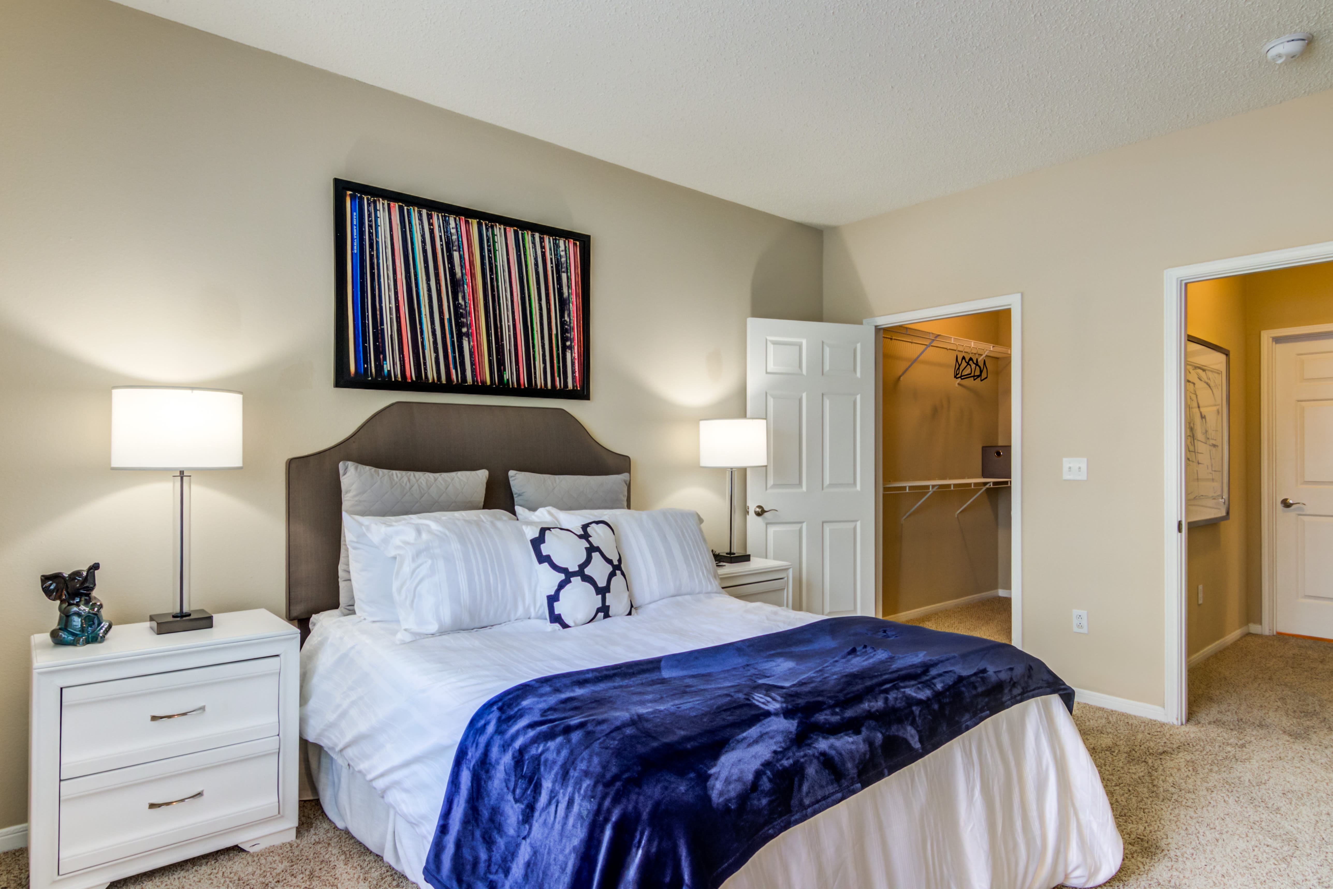Spacious bedroom with carpet floors at Sofi Parc Grove in Stamford, Connecticut